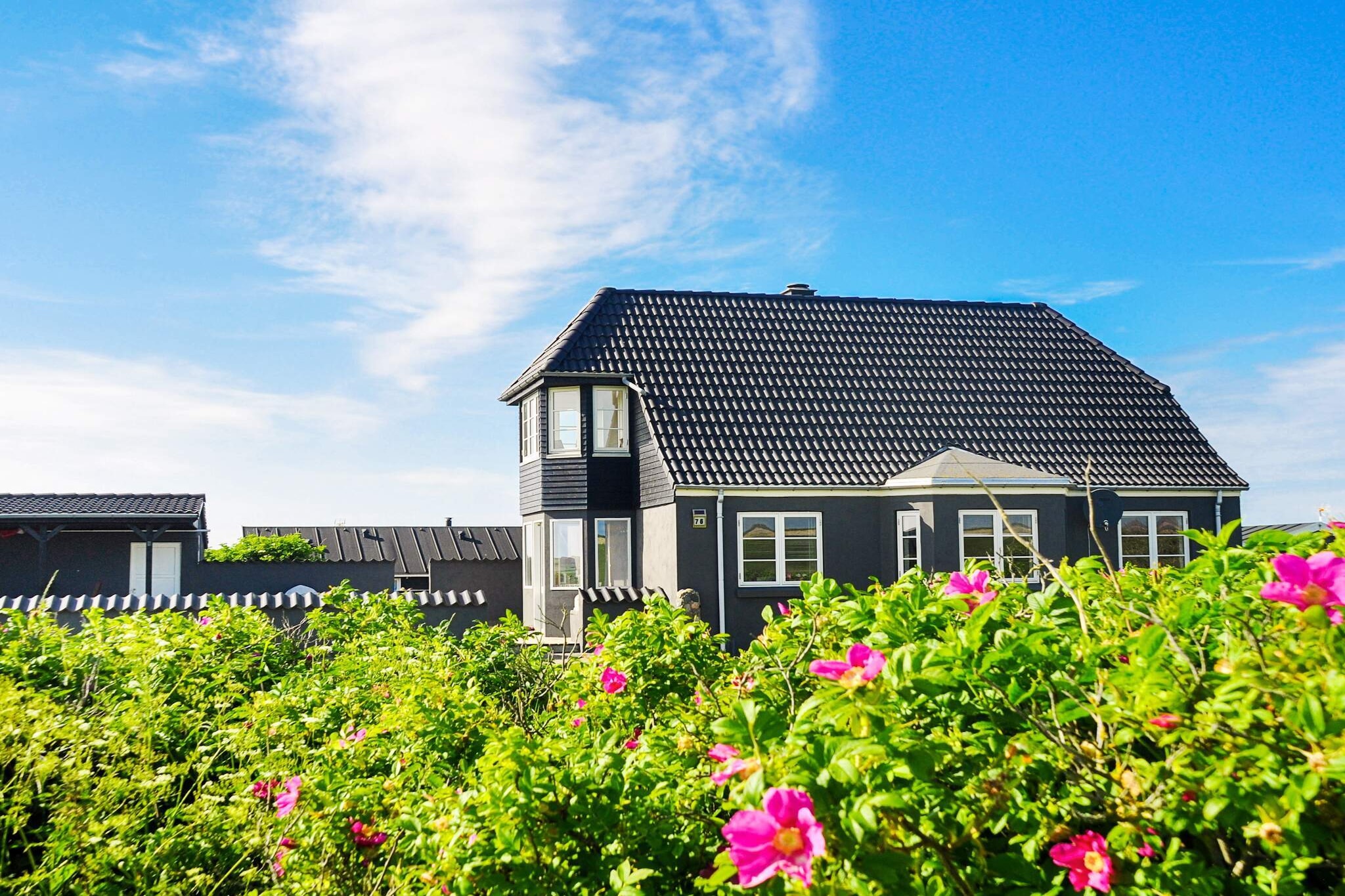 A holiday cottage approx. 300 metres from the sea and approx. 150 metres from the lake of Ferring sø. Admire the view of the lake from the kitchen and 1st floor. The plot is a 1500 m² large natural plot with a large, south-facing and open terrace. Here you can use the grill and enjoy the view of sand dunes. There are plenty of activities available in the garden. The cottage is suitable for 2 families and is located in a lovely area with several attractions for the whole family. No letting to youth groups.A refundable deposit might be charged closer to your check-in date. The security deposit ensures a smooth stay and covers any additional services or consumption charges.This deposit covers utilities consumed during your stay and any additional services that may be taken.The final amount will be adjusted based on actual meter readings, actual usage of extra services, and any remaining balance will be refunded within 21 days after checkout.This deposit simply acts as a prepayment for charges that  you would anyways pay for, ensuring a seamless stay and check-out experience.