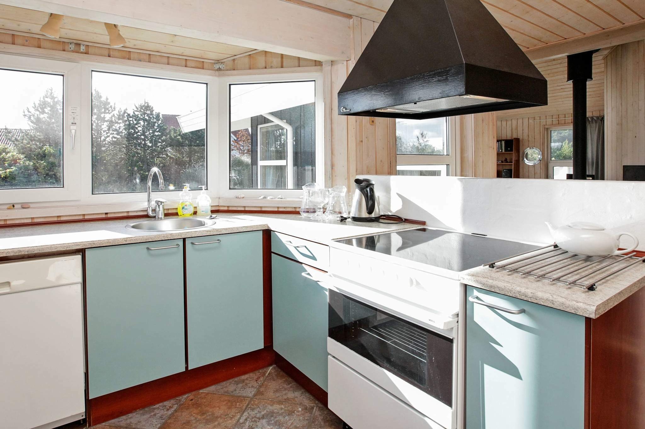 This charming holiday home offers a comfortable and inviting stay for up to six guests. With three well-appointed bedrooms, including two double beds and two single beds, it is perfect for families or groups of friends. The property is pet-free, ensuring a peaceful environment for all guests. The stylish and modern interior boasts a cozy living room featuring a wood-burning stove, ideal for relaxing evenings, and a flat-screen TV with cable access for entertainment. A spacious terrace is perfect for enjoying the outdoors. Located in the heart of Skagen, this holiday home is just a short distance from Solnedgangspladsen and the stunning beaches. The area is rich in natural beauty, with nearby cafes and local markets offering delightful spots for food and shopping. Explore the nearby scenic surroundings or enjoy the vibrant atmosphere of the town’s attractions, making it a fantastic base for a relaxing holiday. The well-equipped kitchen features an electric stove, fridge-freezer, microwave, and dishwasher, providing all the essentials for preparing meals at home. The bathroom includes a shower cubicle, washbasin, WC, and underfloor heating for added comfort. Additional amenities such as a washing machine, tumble dryer, air/air heat pump, and electric heating ensure a convenient and cozy stay, while the natural plot with trees offers tranquility and privacy.A refundable deposit might be charged closer to your check-in date. The security deposit ensures a smooth stay and covers any additional services or consumption charges.This deposit covers utilities consumed during your stay and any additional services that may be taken.The final amount will be adjusted based on actual meter readings, actual usage of extra services, and any remaining balance will be refunded within 21 days after checkout.This deposit simply acts as a prepayment for charges that  you would anyways pay for, ensuring a seamless stay and check-out experience.