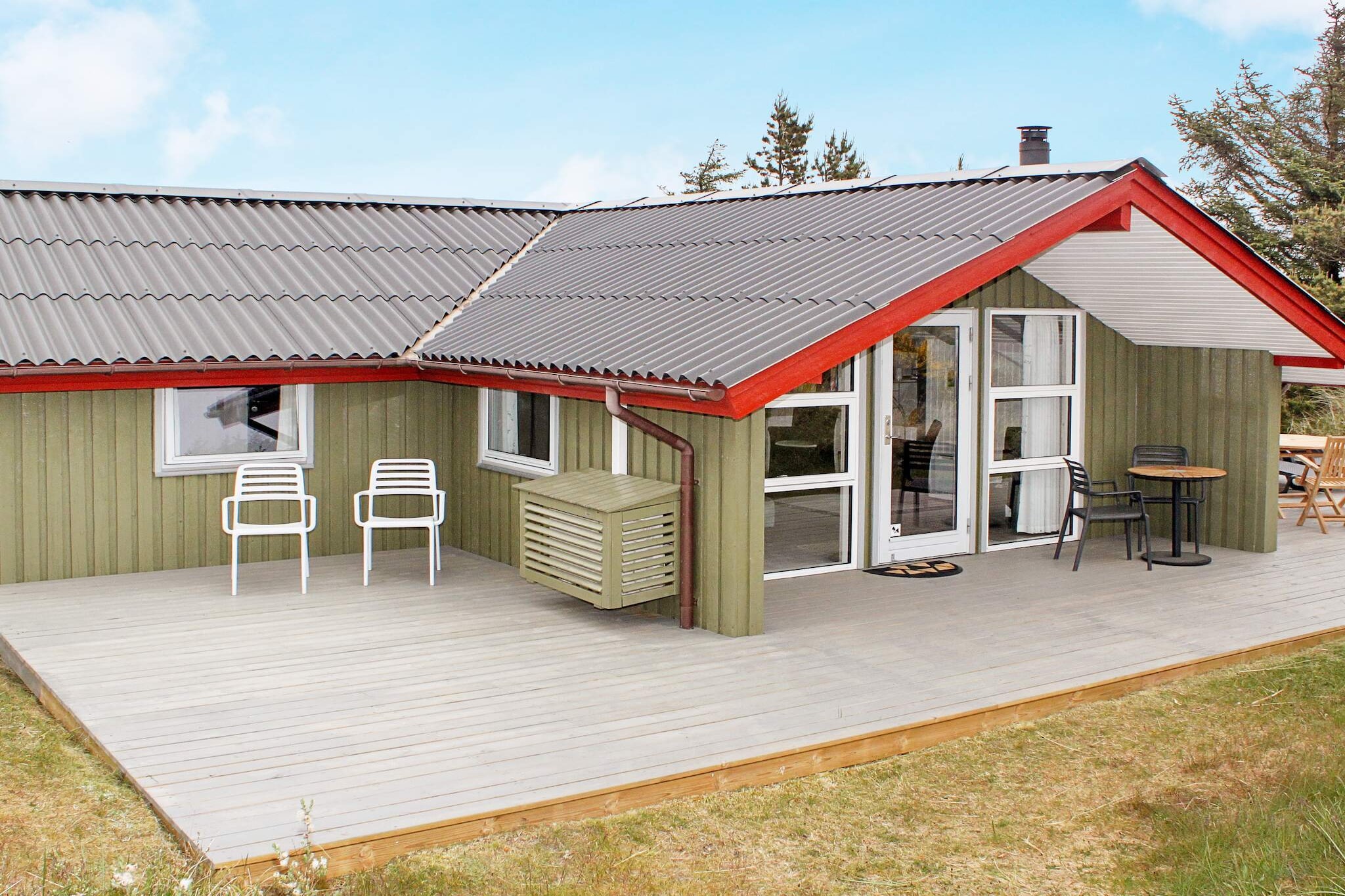 Well-maintained wooden holiday cottage located on a dune plot. Modern furnishings and wood-burning stove. Kitchen from 2005. Partially closed terrace. Not far from Esbjerg and Varde. Short distance to e.g. Legoland with a wealth of activities and houses built of Lego bricks. Givskud Zoo is well worth a visit. No letting to youth groups.A refundable deposit might be charged closer to your check-in date. The security deposit ensures a smooth stay and covers any additional services or consumption charges.This deposit covers utilities consumed during your stay and any additional services that may be taken.The final amount will be adjusted based on actual meter readings, actual usage of extra services, and any remaining balance will be refunded within 21 days after checkout.This deposit simply acts as a prepayment for charges that  you would anyways pay for, ensuring a seamless stay and check-out experience.