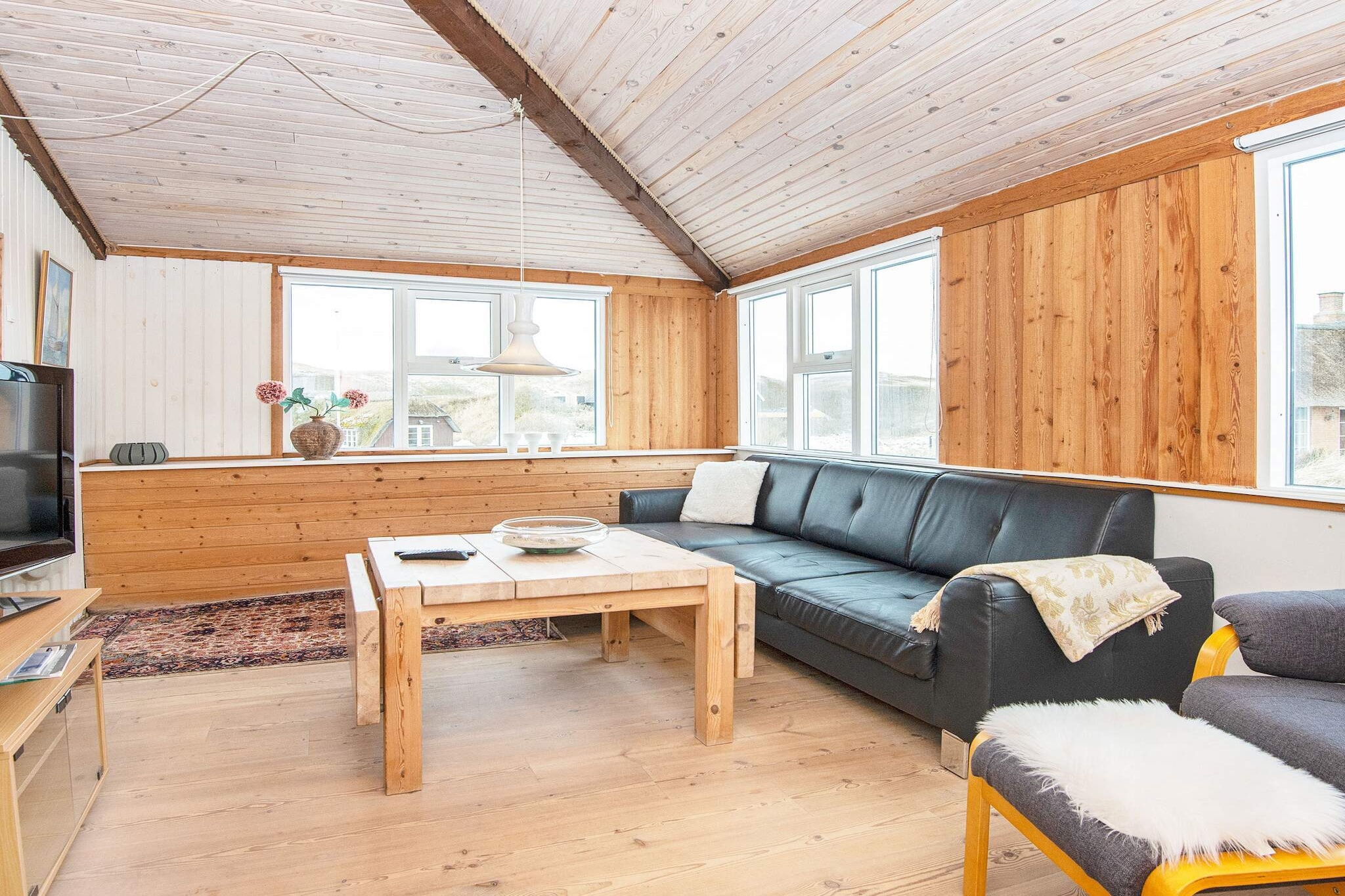 Holiday cottage with great location approx. 300 m from the North Sea and within walking distance to the centre of Søndervig, which makes the house ideal for those who both want to be close to the sea and city life. The house is joined with another house and has mixed furnishings with a lot of older furniture. Living room, kitchen, living room, bathroom and 2 bedrooms on the ground floor and 1 bedroom on 1st floor.  The house has a nice view of the area.A refundable deposit might be charged closer to your check-in date. The security deposit ensures a smooth stay and covers any additional services or consumption charges.This deposit covers utilities consumed during your stay and any additional services that may be taken.The final amount will be adjusted based on actual meter readings, actual usage of extra services, and any remaining balance will be refunded within 21 days after checkout.This deposit simply acts as a prepayment for charges that  you would anyways pay for, ensuring a seamless stay and check-out experience.