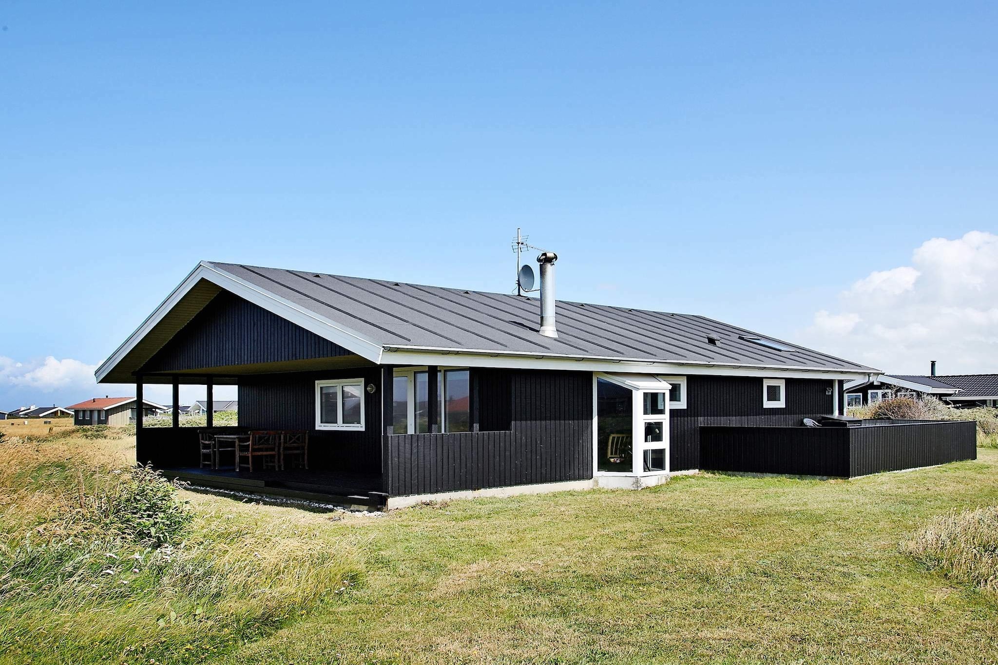 Holiday cottage with a sauna renovated in 2007 with good sea views from all bedrooms and living room, terrace and plot. Located on a natural plot at the attractive Nørlev Strand. The house appears very bright and with modern, tasteful decor. Bathroom from 2014. Kitchen and living room in open plan. Living and dining area is separated from the kitchen from 2007 and with all known comforts. The 3 bedrooms all have double beds, in addition the mezzanine has a sofa bed for 2 people. The mezzanine has skylights and good height (1.5 m), here you also have a very beautiful sea view. The living room has leather furniture from 2007 and a wood-burning stove for the cold evenings. The living room also has good sea views and access to both the covered and the open terrace.A refundable deposit might be charged closer to your check-in date. The security deposit ensures a smooth stay and covers any additional services or consumption charges.This deposit covers utilities consumed during your stay and any additional services that may be taken.The final amount will be adjusted based on actual meter readings, actual usage of extra services, and any remaining balance will be refunded within 21 days after checkout.This deposit simply acts as a prepayment for charges that  you would anyways pay for, ensuring a seamless stay and check-out experience.