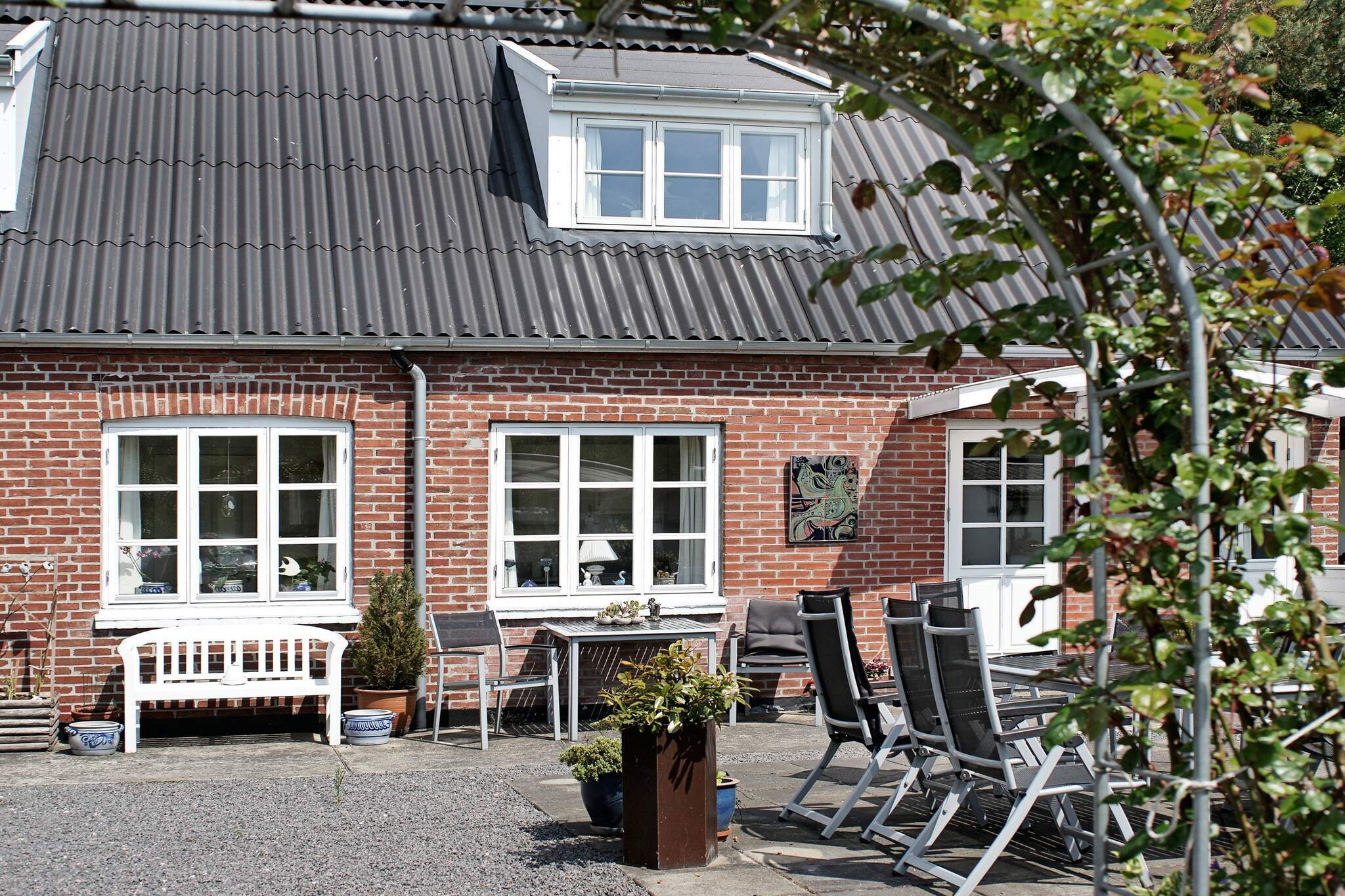 This holiday apartment on the first floor at Balka, south of NexÃ¸, has bright furnishings. One of the bedrooms with a double bed is a communicating room. Big, open terrace with garden furniture and grill. Covered terrace. Lovely area with great nature - direct access to bird sanctuary and bicycle track to Balka, SnogebÃ¦k and Dueodde. Close to one of the finest sandy beaches and to charming SnogebÃ¦k, a fishing hamlet, with nice restaurants and shops. Electricity and heating are included in the rent. Boxer TV with ZDF among other channels.