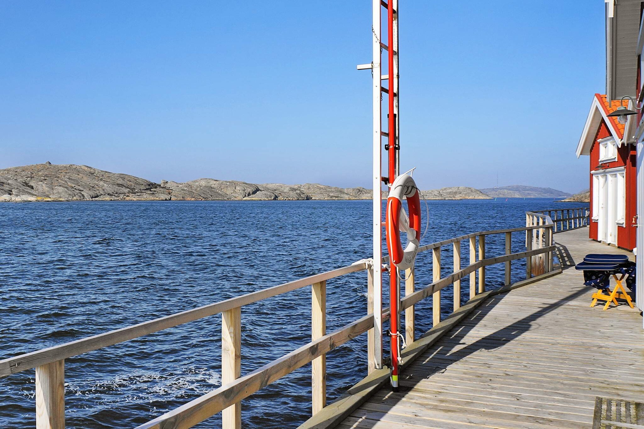 This attractive holiday home is located in the archipelago, in the town of SkÃ¤rhamn, on the island of TjÃ¶rn. The house boasts an amazing panoramic view of the sea, a private anglerâ€™s house, and a private dock right next to the house. This comfortable house offers the perfect location suitable for holidays any time of the year! The two-storey house features a beautiful kitchen, and a spacious living room/ dining room. The living room leads to the comfortable, roofed terrace.The bottom floor also contains a bathroom (WC and shower) and a laundry room. On the upper floor you will find the family room with itâ€™s TV-area and 30 TV-channels (Swedish channels as well as English-speaking channels). The family room has a sofa bed that sleeps two. The bedroom is spacious and contains one double bed. The upper floor bathroom contains a shower and a small whirlpool that fits one adult or two children. On the upper floor there is also a lovely balcony with a panoramic view. Please note that it is not allowed to charge electric cars. The lovely anglerâ€™s house is well-furnished and a ladder leading to a spacious loft with a double bed (legless). The closest beach is only 400 metres from the house. There is a sandy beach, rocks and a bathing dock. There are also crab fishing possibilities. SkÃ¤rhamn offers culture and entertainment. Visit Nordiska Akvarellmuseet, a museum of contemporary aquarelle art. Or visit the restaurants, boutiques and shops in the town! Welcome to this wonderful holiday home!