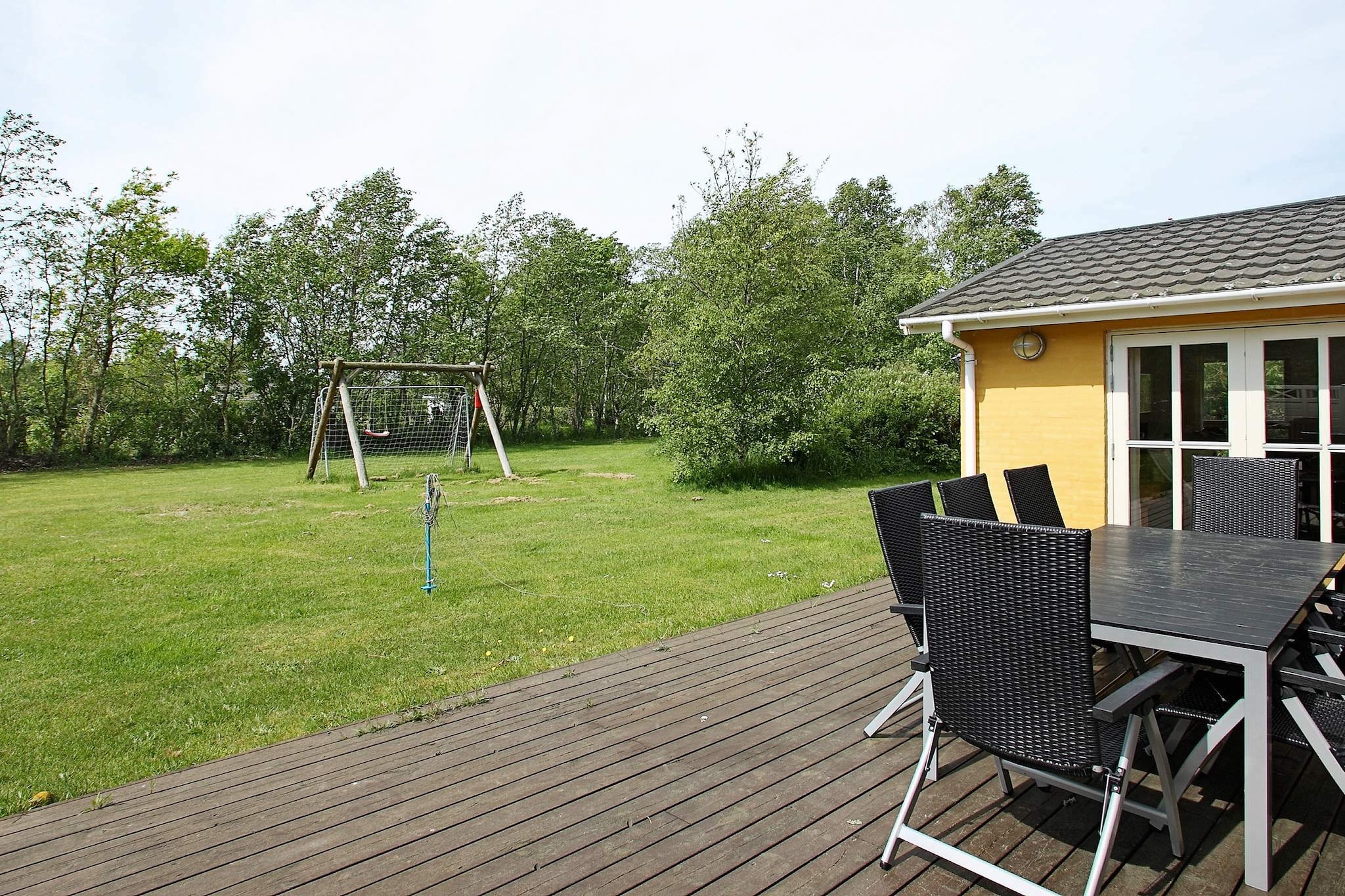 Approx. 250 metres from a wide and family friendly beach, you find this  holiday cottage on a quiet cul-de-sac. There is a whirlpool in one of  the bathrooms. The large windows give a great inflow of light. Barbecue  on the large terrace while enjoying the sun. The house is located on a  large and peaceful plot.A refundable deposit might be charged closer to your check-in date. The security deposit ensures a smooth stay and covers any additional services or consumption charges.This deposit covers utilities consumed during your stay and any additional services that may be taken.The final amount will be adjusted based on actual meter readings, actual usage of extra services, and any remaining balance will be refunded within 21 days after checkout.This deposit simply acts as a prepayment for charges that  you would anyways pay for, ensuring a seamless stay and check-out experience.