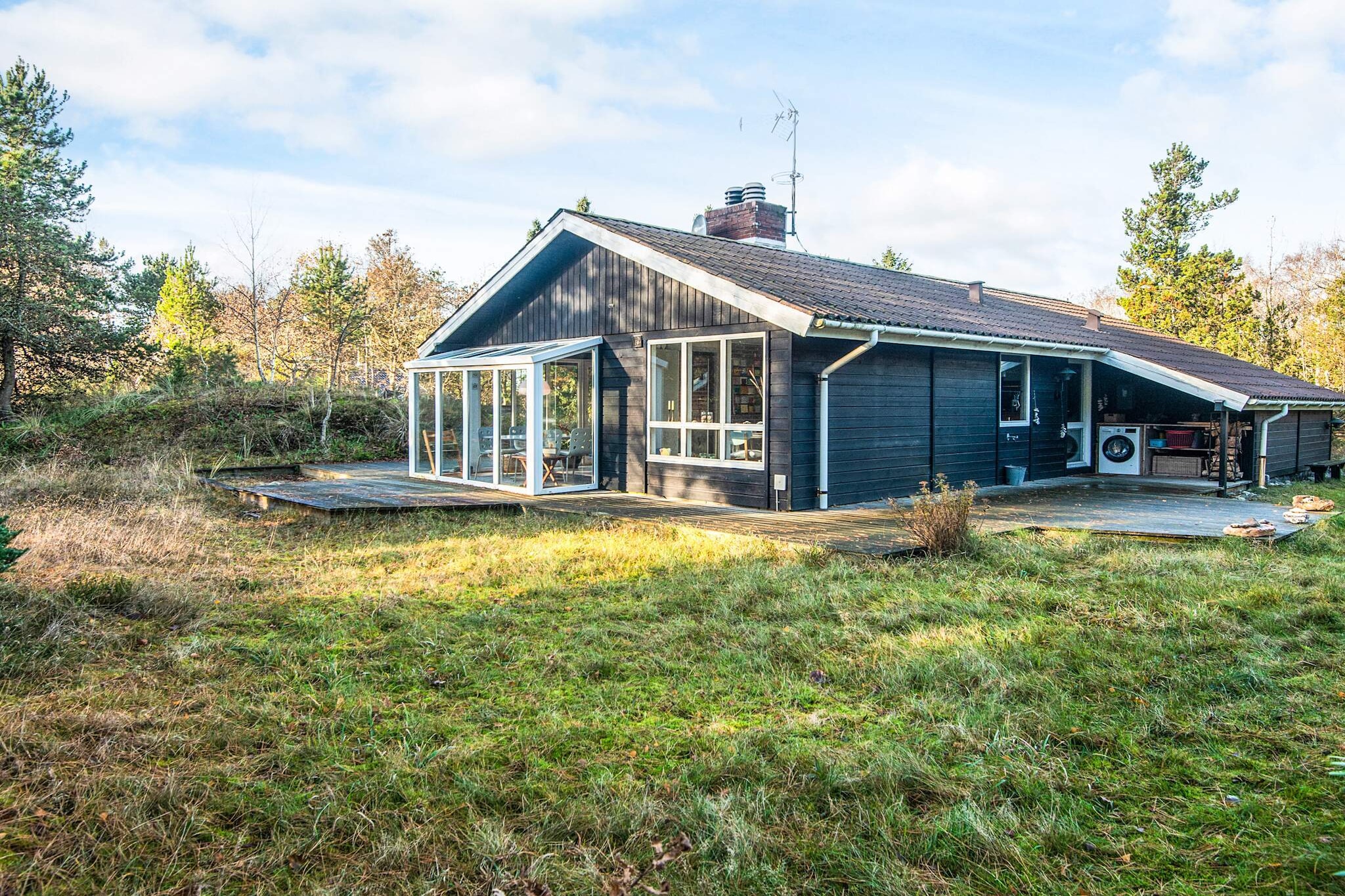 Charming Holiday Home Near Fjellerup Beach This inviting holiday home is just 4 minutes from one of Djursland's best beaches, making it the perfect getaway for anyone looking to enjoy the Danish summer. The house features a well-equipped kitchen and a lovely conservatory that seamlessly connects the living room and kitchen, offering additional space and a cozy atmosphere. With bright, comfortable rooms and a large natural plot of 1400 mÂ², itâ€™s a great place to relax and enjoy the outdoors. Whether youâ€™re enjoying a sunny day or taking a peaceful break, this house provides the perfect setting for a memorable holiday. Key Features:  Living Room: Cozy space with a fireplace, wood-burning stove, radio, DVD player, TV, satellite dish, and a high chair. Bedrooms: 1 double bed, 1 twin bed, 1 double bed, plus a cot for younger guests. Kitchen: Fully equipped with an electric stove, fridge-freezer, microwave, extractor hood, coffee maker, dishwasher, and a washing machine for added convenience. Bathroom: Includes WC, sink, and shower cubicle. Outdoor Area: Terrace, covered terrace, carport, and a spacious natural plot ideal for sunbathing or outdoor dining.  Explore Fjellerup Strand Fjellerup Strand in Norddjursland offers a perfect combination of nature and stunning landscapes. The area is rich in large forests, river valleys, and breathtaking coastlines. Itâ€™s an ideal destination for outdoor enthusiasts, with opportunities for cycling, hiking, and running. The wide sandy beaches along the Kattegat, large dunes, and high chalk cliffs are perfect for exploring and fossil hunting. Whether youâ€™re crossing the picturesque Randers Fjord by ferry or simply relaxing on the beach, Fjellerup Strand promises a refreshing and peaceful holiday experience.A refundable deposit might be charged closer to your check-in date. TheÂ securityÂ depositÂ ensuresÂ aÂ smoothÂ stayÂ andÂ coversÂ any additionalÂ servicesÂ orÂ consumptionÂ charges.ThisÂ depositÂ coversÂ utilitiesÂ consumedÂ duringÂ yourÂ stay andÂ anyÂ additionalÂ servicesÂ thatÂ mayÂ beÂ taken.TheÂ finalÂ amountÂ willÂ beÂ adjustedÂ basedÂ onÂ actualÂ meter readings,Â actualÂ usageÂ ofÂ extraÂ services,Â andÂ anyÂ remaining balanceÂ willÂ beÂ refundedÂ withinÂ 21Â daysÂ afterÂ checkout.ThisÂ depositÂ simplyÂ actsÂ asÂ aÂ prepaymentÂ forÂ chargesÂ that Â youÂ wouldÂ anywaysÂ payÂ for,Â ensuringÂ aÂ seamlessÂ stayÂ and check-outÂ experience.