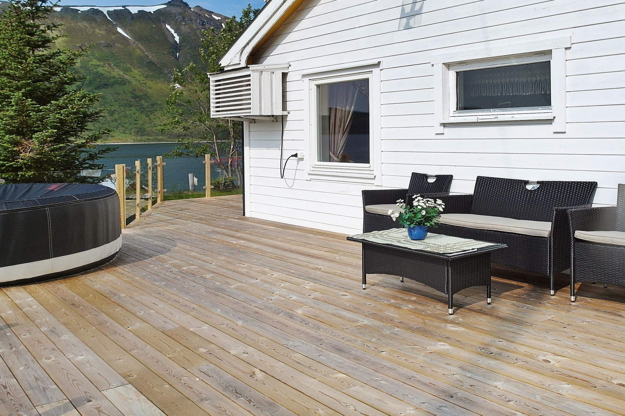 Boat: \n\nKitchen(12 m2)(cooker(electric), hood, coffee machine(filter), microwave, dishwasher, fridge, freezer(> 250L), tumble dryer, washing machine), Living/bed room(28 m2)(TV(satellite, german television channels), radio), bedroom(single bed, double bed), bedroom(single bed, double bed), bedroom(2x single bed), bedroom(2x single bed), bathroom(washbasin, toilet), bathroom(floor heating)(bathtub or shower, washbasin, toilet), Bubble bath(outside, heated, 5 persons), heating(electric), terrace(100 m2), garden furniture, BBQ, fish cleaning table, air to air heatpump