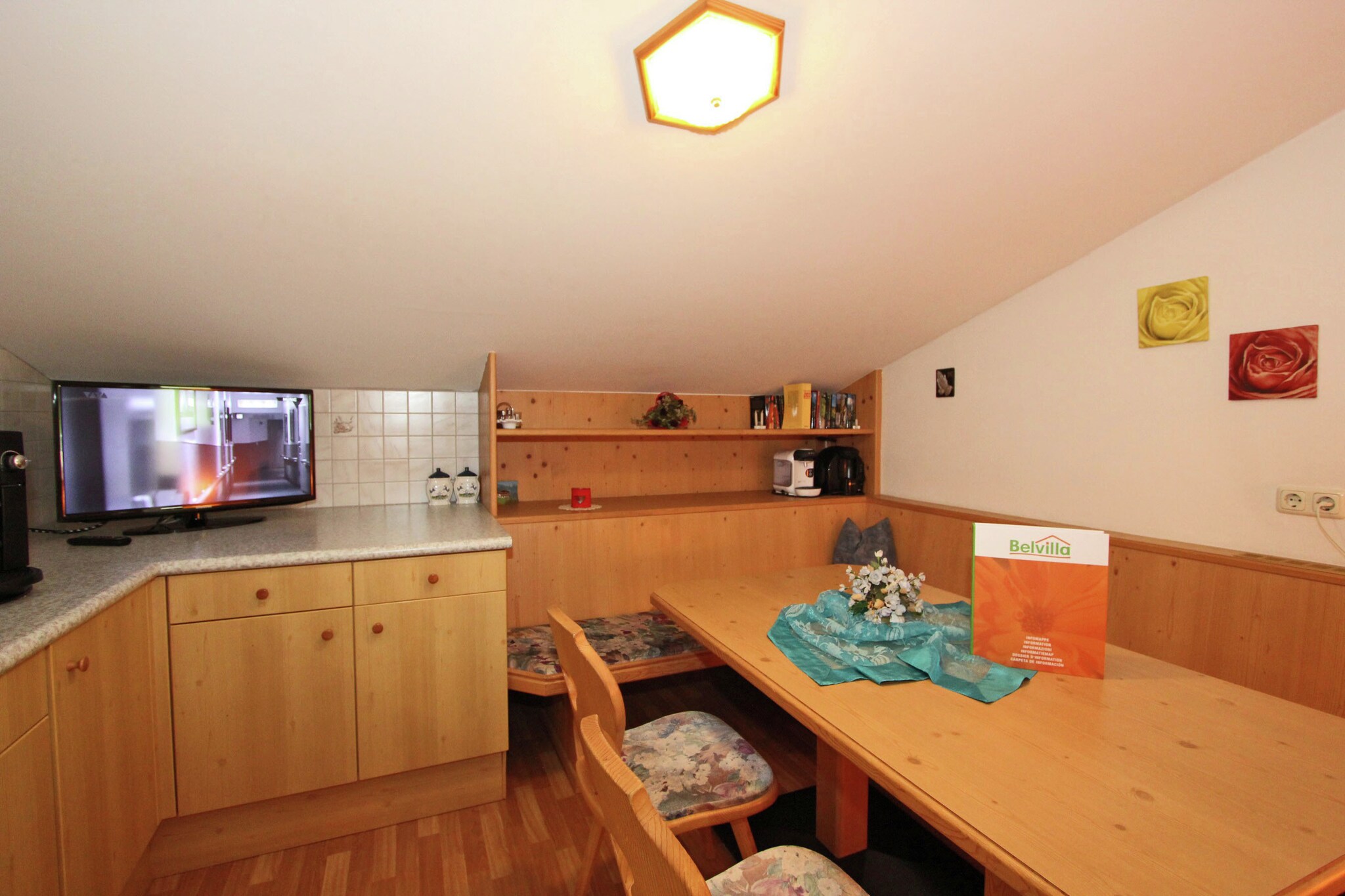 On the 1st floor: (Large kitchen(TV(flatscreen, satellite), dining table, coffee machine, oven, fridge-freezer), bedroom(double bed), bedroom(single sofa bed, double bed), bedroom(double bed, double sofa bed), bathroom(shower, washbasin, toilet), bathroom(shower(unit), washbasin, toilet), bathroom(shower(unit), washbasin, toilet), Landing)\n\nski storage, ski boot heaters, balcony, heating(central), parking, children\'s bed