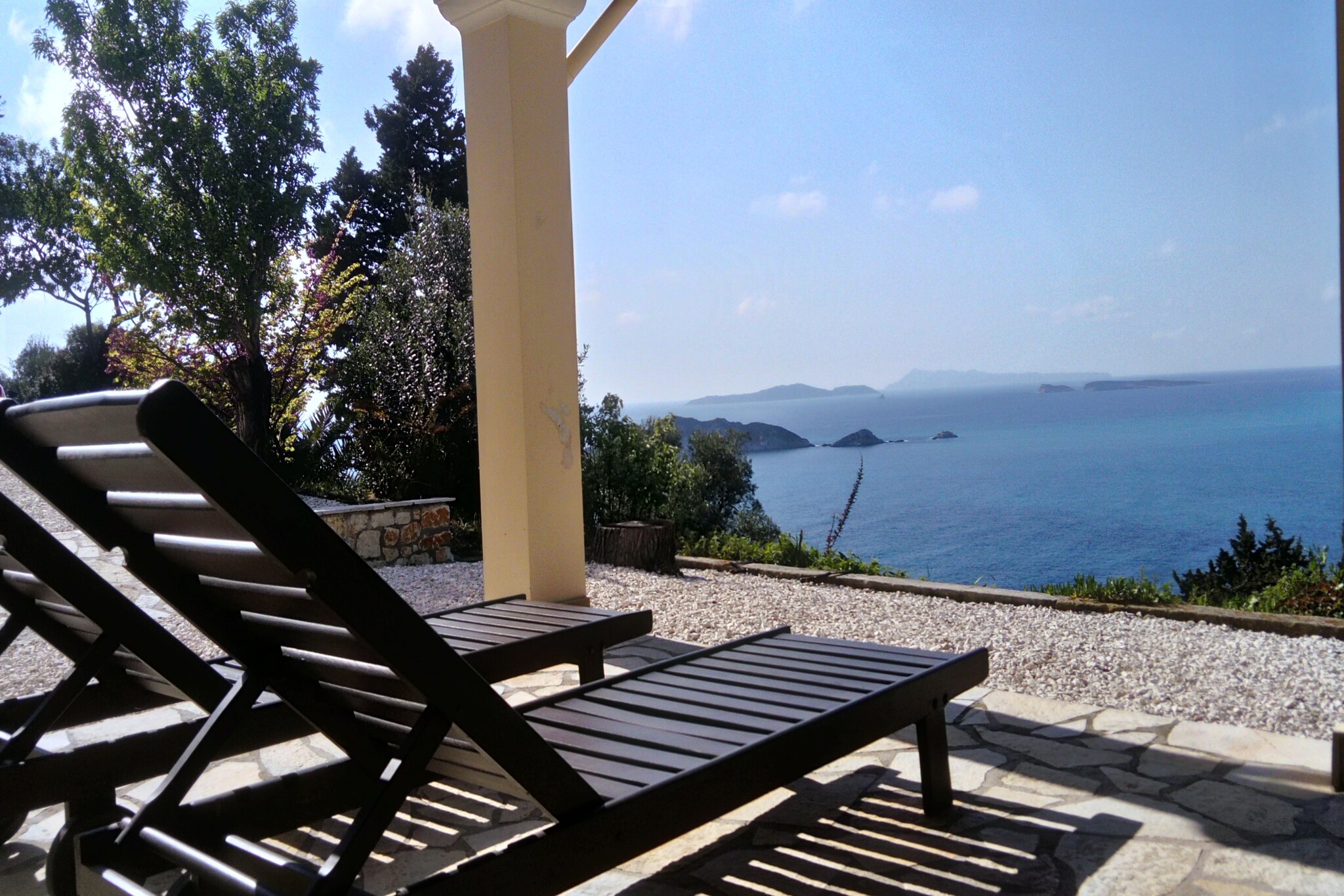 This villa in Afionas is equipped with a barbecue, and the home is perfect for families with kids and small groups. The home has a well-equipped open kitchen, terrace, air conditioning, private and fenced garden with furniture, and parking. 

The nearest restaurant is 0.1 km away and the supermarket is 2 km away.  Afionas also gives you a phenomenal view of the sea: Agios Georgios and Arillas and is widely known for its beautiful sunsets. The seaside resorts of Agios Georgios and Arillas have a blue flag beach with many water sports and numerous restaurants, cafés, and shops. 

The home has a well-equipped open kitchen, terrace, private and fenced garden with furniture, and parking. The air conditioning units can be used for cooling or heating in the living room and the bedrooms. The TV set is connected to a satellite. But there is also an HDMI cable available so that you can connect your PC or tablet directly to the TV set.

Kapodistrias Airports is 33 km away.