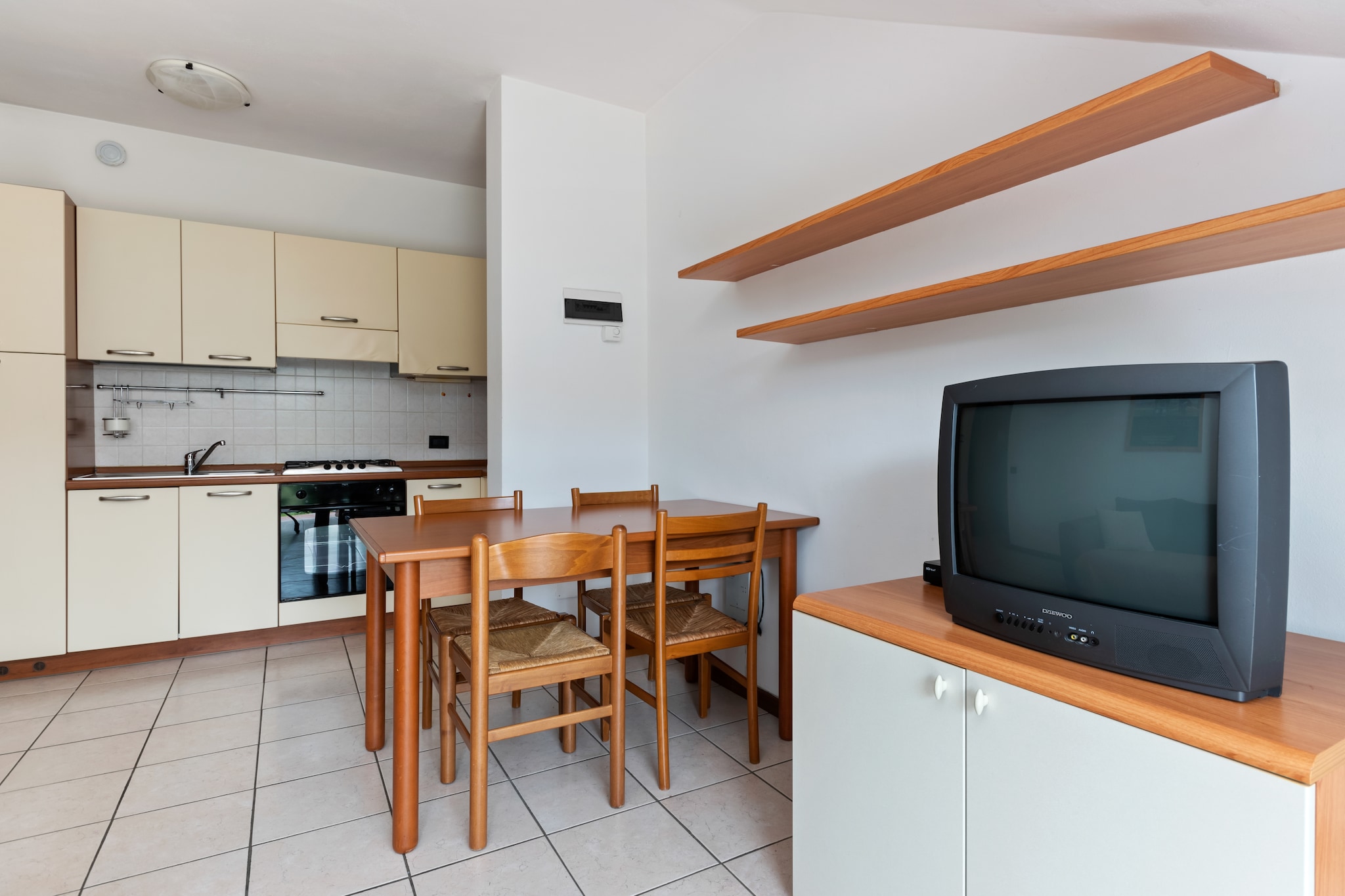 Ground floor: (Living room(double sofa bed, TV(satellite)), open kitchen, bedroom(double bed), bathroom(shower, washbasin, toilet, bidet), heating(central, gas), terrace(private), garden furniture)\n\ngarage, garden(shared with other guests), garden furniture, swimming pool(shared with other guests, including part for children (depth 50cm), 16 x 8 m., opened from 1/2 May upto and including 1/2 Sep)