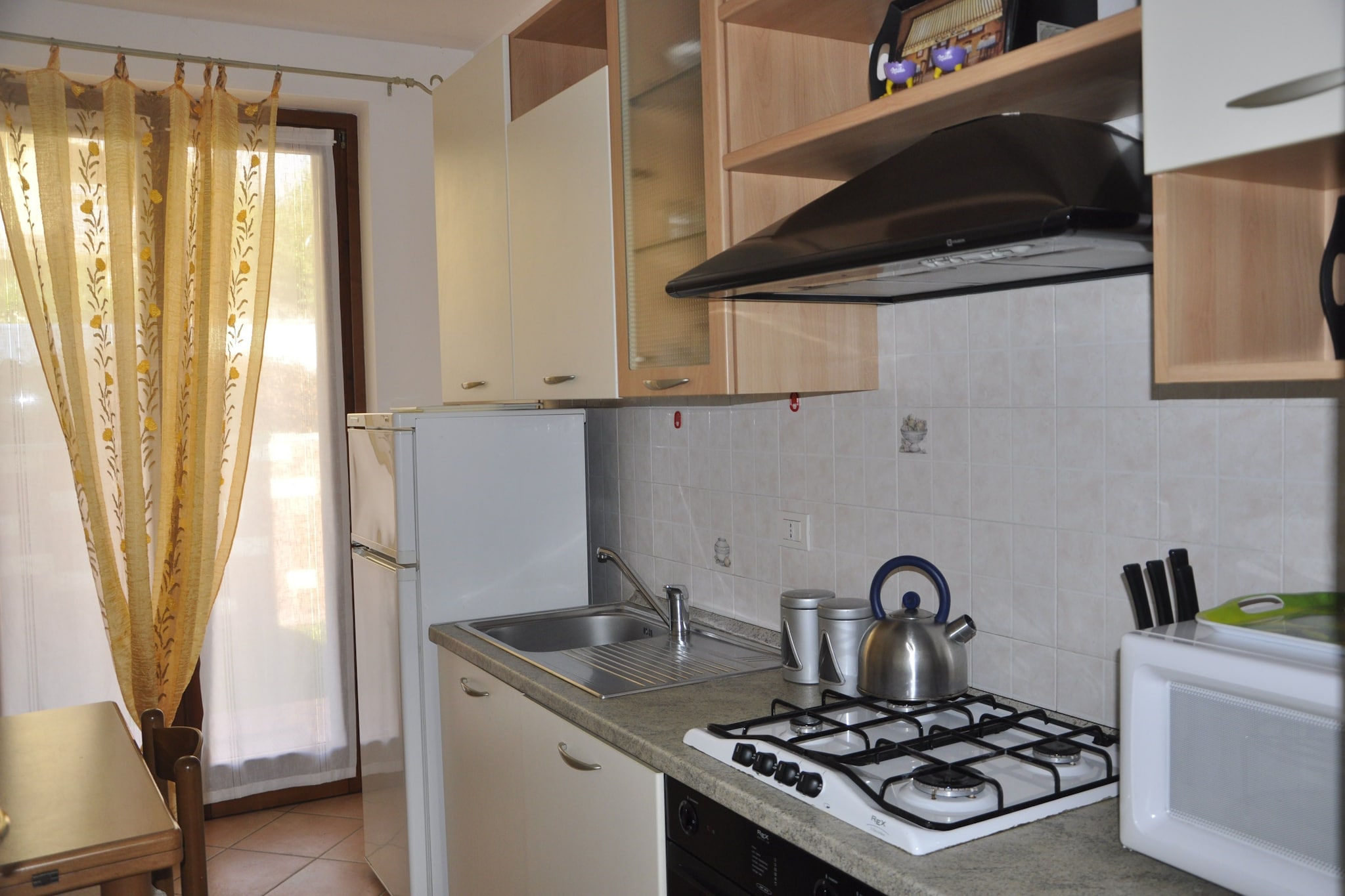 Ground floor: (open kitchen, Living/diningroom(double sofa bed, TV(satellite)), bathroom(shower, washbasin, toilet))\n\nOn the 1st floor: (bedroom(double bed, balcony), bedroom(2x single bed), bedroom(bunk bed, balcony), bathroom(shower, washbasin, toilet))\n\nBasement: (bedroom(double bed or 2 single beds), washing machine)\n\ngarage, heating(central, gas), terrace(shared with other guests), garden(private, shared with other guests, partially fenced), garden furniture, BBQ, swimming pool(shared with other guests, opened from 1/2 May upto and including 1/2 Sep)