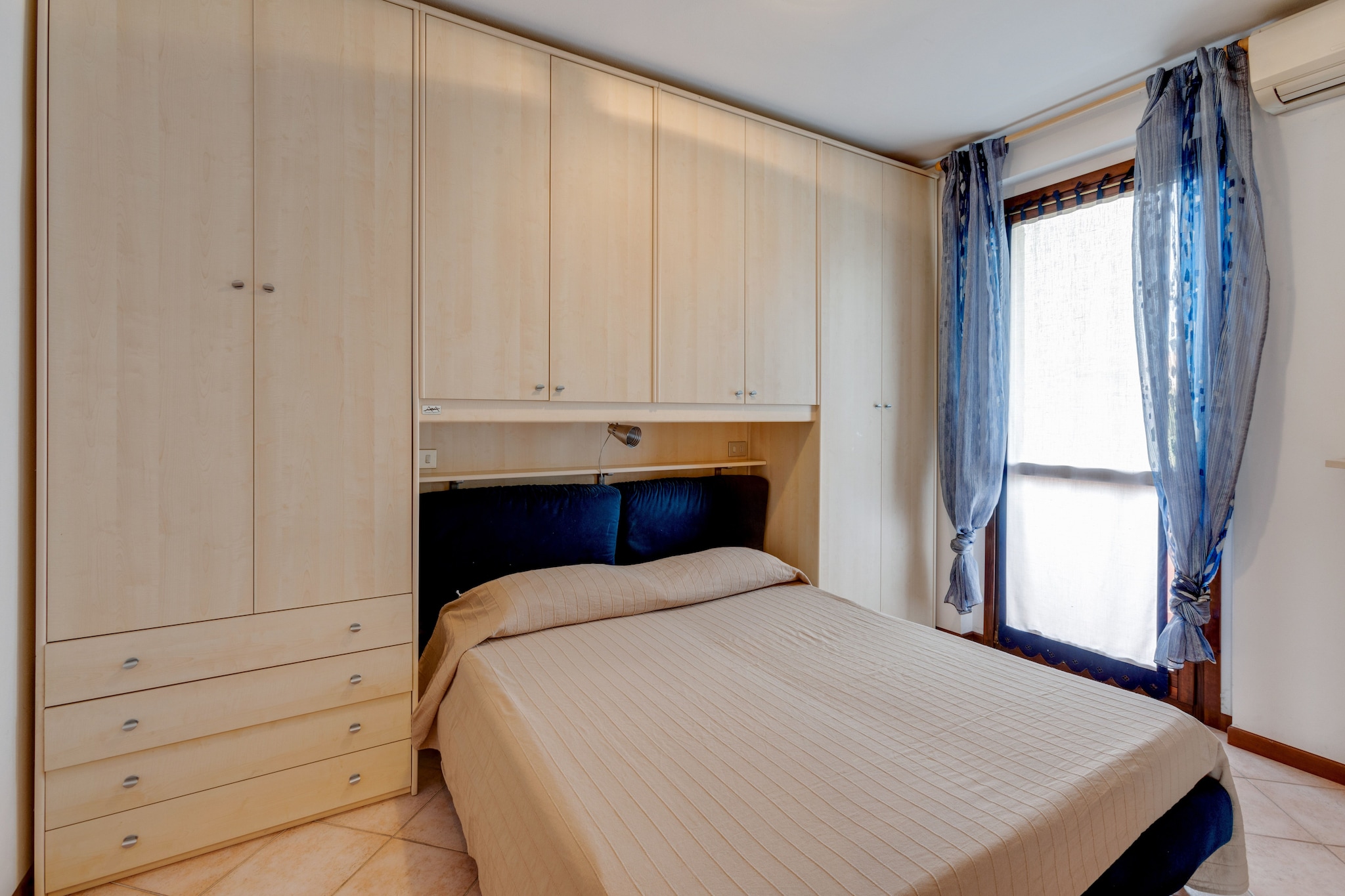 On the 1st floor: (open kitchen, Living/diningroom(double sofa bed, TV(satellite)), bedroom(double bed), bedroom(single trundle bed, bunk bed), bathroom(shower, washbasin, toilet), washing machine, 2x balcony, heating(central, gas), air conditioning)\n\ncarport, terrace(shared with other guests), garden furniture, swimming pool(shared with other guests, 14 x  6 m., opened from 1/2 May upto and including 1/2 Sep)