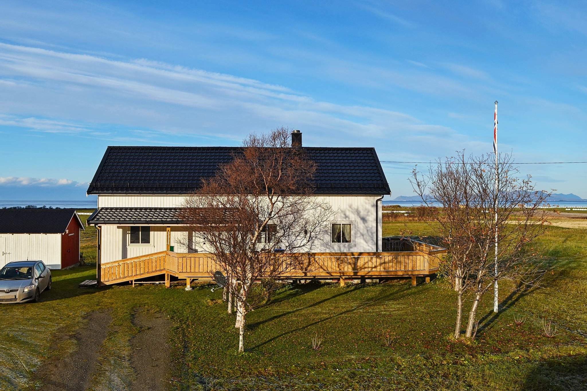 A wonderful and comfortable holiday home in Lofoten with a stunning view of the sea, midnight sun in the summer and Northern lights during winter. The holiday house is 47 km north of Svolvær. Built in 1966, it has been completely renovated and appears modern and spacious with secluded and peaceful surroundings. The house is suitable for small or large groups, or several families travelling together. Bed linen and towels are included in the price. The yard is child-friendly and you can let children play safely. Smart-TV with TV channels through internet streaming. Wheel chair platform by the main entrance and wide doors and spacious bathroom. The large sliding door to the terrace makes it possible to use wheelchair. Plenty of parking space for several cars. The house is 300 metres from the sea. Enjoy the panoramic view of the sea through the large windows of the living room. The midnight sun in summer is a spectacular view, so are the Northern Lights on clear winter skies. The beaches below the house is the perfect playground for children. Great mountain skiing in winter. This is a good starting point for day excursions by car around Lofoten. There is a café in the village that is open during summer. Sandsletta is 22 km away where you can rent canoes and pedal boats. 2 of the single beds are 190 cm long.