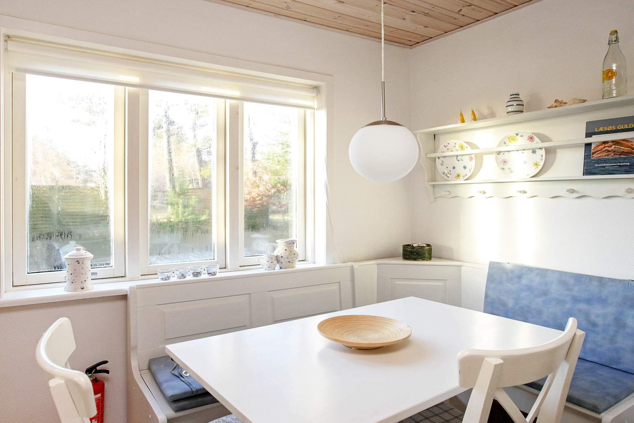 open kitchen(cooker(electric), hood, coffee machine, fridge, washing machine), Living/bed room(TV(danish TV channels (DR1 and TV2)), DVD player, radio, CD player, stereo unit), bedroom(double bed), bedroom(2x bunk bed), bathroom(floor heating)(bathtub or shower, washbasin, toilet), heating(electric), terrace, BBQ