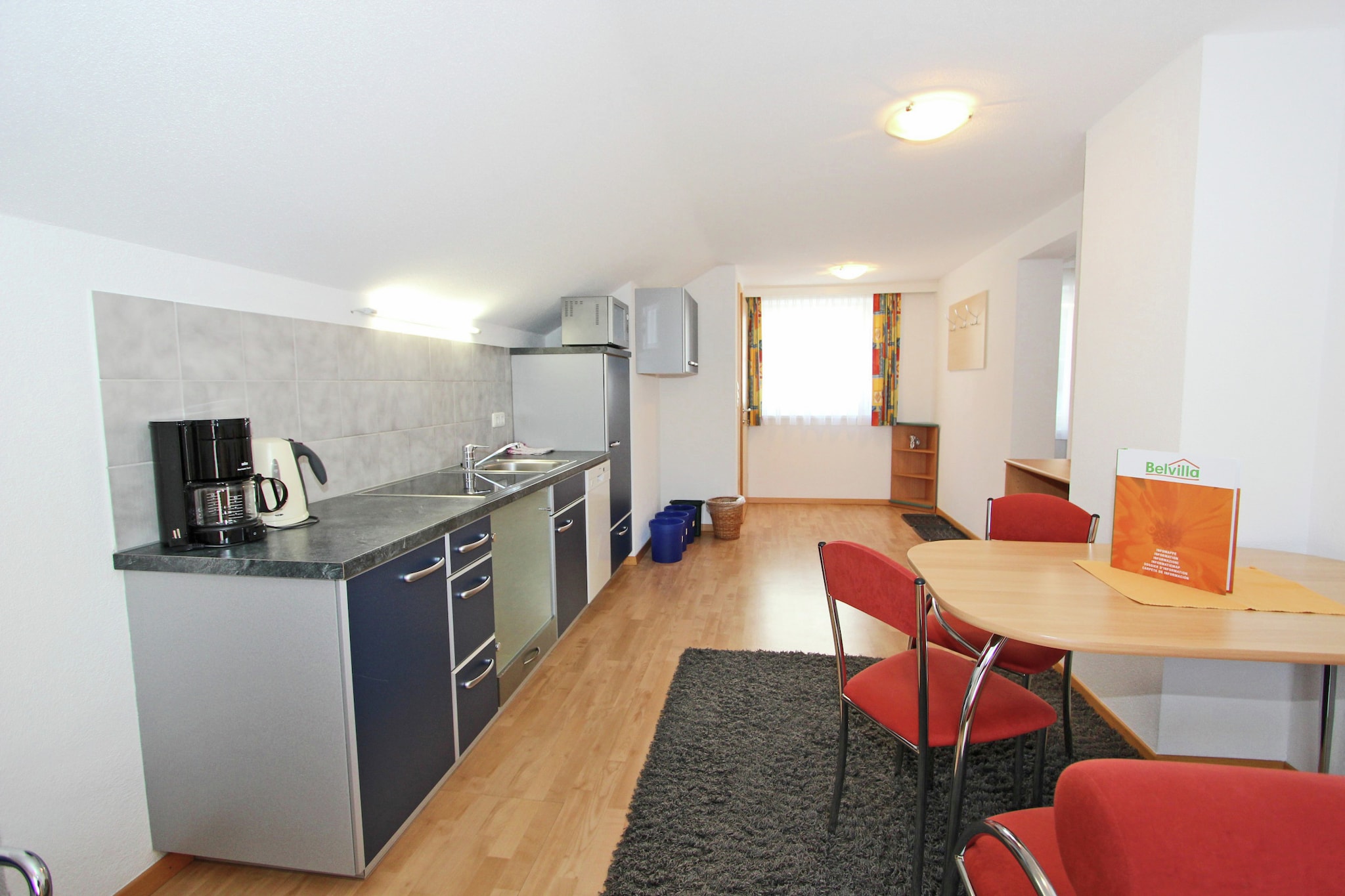 Attic: (open kitchen(single sofa bed, TV(flatscreen, satellite), cooker(4 ring stoves, ceramic), coffee machine, microwave, dishwasher, fridge-freezer), bedroom(double bed, double sofa bed), bathroom(shower(unit), washbasin, toilet), Landing)\n\nEntrance, cot, heating(central), terrace, parking