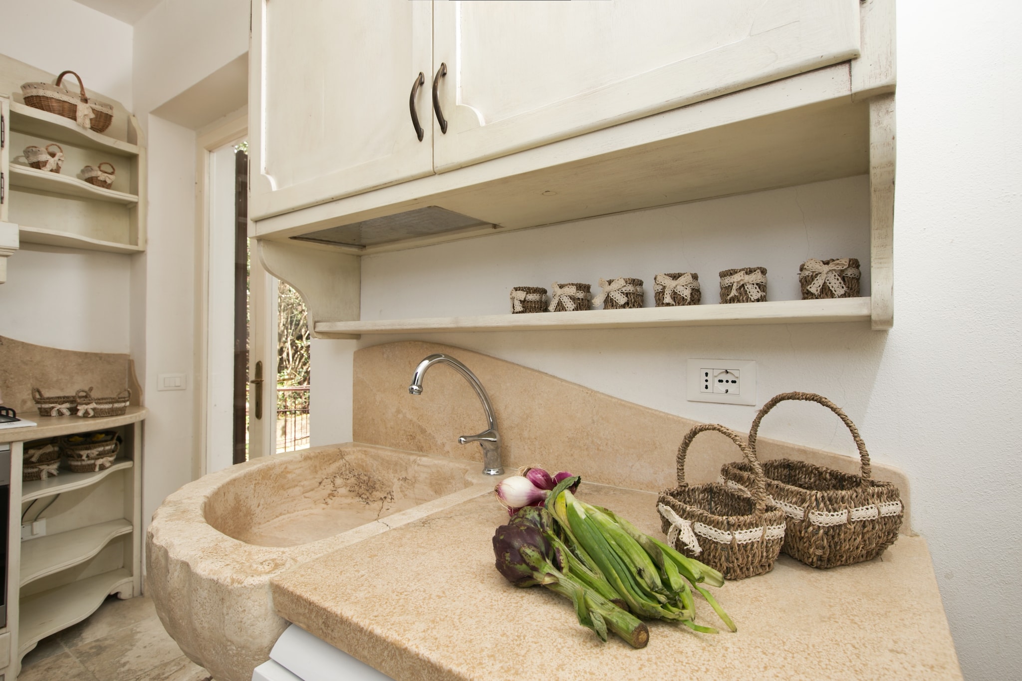 Ground floor: (Living room(single sofa bed, fireplace), Kitchen(TV(satellite), oven, dishwasher, fridge(+ freezer), washing machine), bedroom(bunk bed), bedroom(double bed), Bedroom with bathroom(single bed, double bed), bathroom(shower))\n\nheating(central), terrace, BBQ