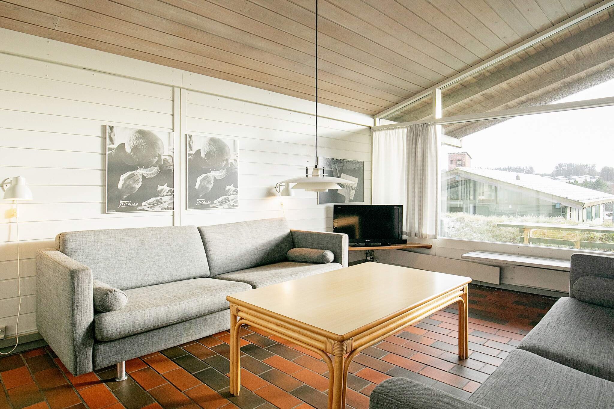 Escape to the wild beauty of northwest Jutland with a stay at this cozy holiday home in scenic Vigsø Holiday Center—perfect for families, couples, and nature lovers alike. Set just a short walk from the child-friendly beaches of Vigsø Bay and the dramatic North Sea, the home offers the perfect balance of relaxation and adventure. Whether you're drawn to the calm summer breeze or the crashing waves, this location brings Denmark’s stunning coastline right to your doorstep.

The 2-bedroom home (plus a sleeping loft) accommodates up to 6 guests comfortably. Inside, you'll find a warm, inviting living room with a wood-burning stove, cable TV, and a radio for relaxing evenings. The open kitchen is fully equipped with a stove, fridge/freezer, dishwasher, and coffee maker. A bright bathroom with a shower completes the setup, making this your perfect home-away-from-home. For cooler months, bring slippers—tiled floors keep things fresh, but your toes will thank you!

Guests have free access to Vigsø’s indoor water park with a 50-meter water slide, hot tub, and waterfall shower. On-site activities range from motocross and tennis to bike rentals and summer candy-making fun for the kids. With high-speed fiber internet and a wealth of TV channels included, you’ll stay connected even while getting away from it all. Just minutes from Hanstholm, the Limfjord, and Thy National Park, this holiday home puts the best of northern Denmark within easy reach.

Note: Please call the Danland team before bringing your pets for a final confirmation.
