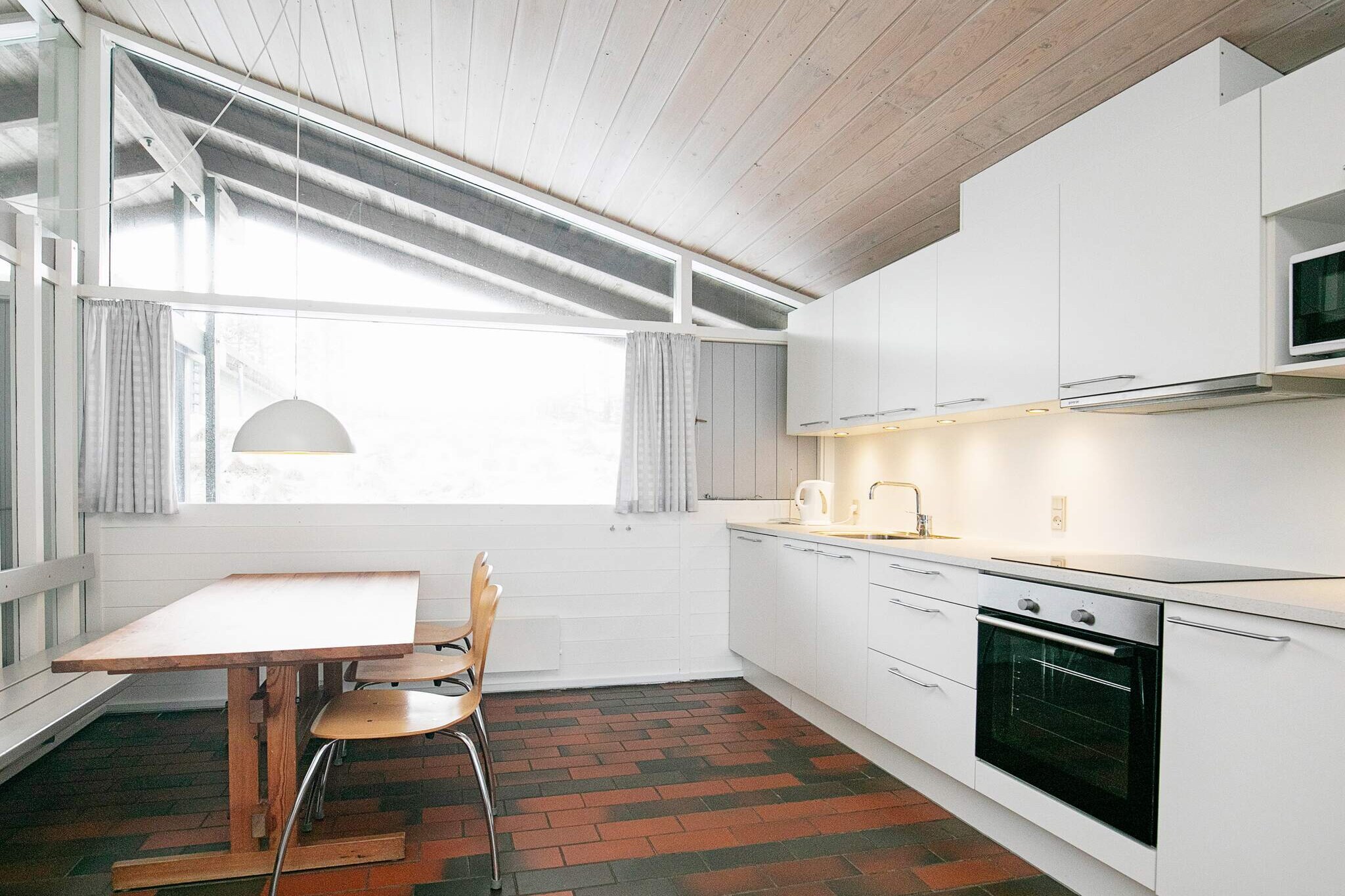 Kitchen(8 m2)(cooker(electric), hood, coffee machine, dishwasher, fridge(+ freezer)), Living/bed room(20 m2)(TV(cable), radio), bedroom(double bed), bedroom(2x single bed), bathroom(floor heating)(bathtub or shower, washbasin, toilet), mezzanine(2x single bed), terrace, parking, swimming pool(shared with other guests, indoor)