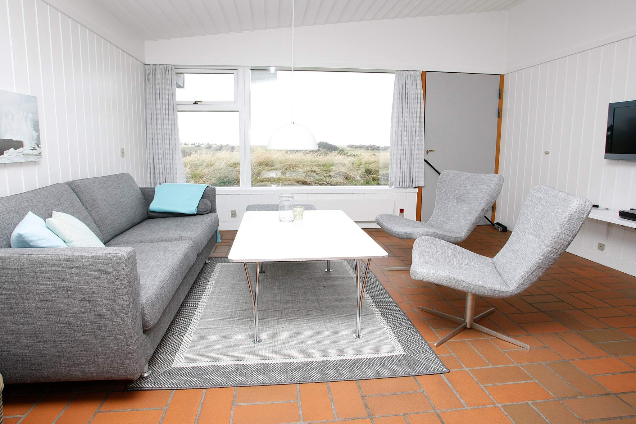 Welcome to this bright and spacious premium holiday home in the heart of Vigsø Holiday Center, offering 81 m² of comfort and style. The home features a cozy living room with a wood-burning stove, cable TV, and plenty of space for relaxing after an active day. Two comfortable bedrooms accommodate up to 6 guests with a combination of a double bed, single beds, and bunk beds — perfect for families or couples traveling together. With two bathrooms featuring underfloor heating and modern showers, convenience is never far away.
The well-equipped kitchen includes everything you need: electric stove, refrigerator with freezer, dishwasher, coffee machine, and extractor hood ideal for cooking up a delicious family meal. Dine indoors or take your meal out to the terrace and enjoy the fresh sea air. The home is connected to high-speed fiber internet and includes a wide selection of TV channels, so you're always connected and entertained even on a rainy day.
Located within walking distance of Vigsø Bay’s child-friendly beach, this home gives you access to a wide range of activities: a heated water park, hot tubs, a 50-meter water slide, tennis, motocross, and more. Whether you’re here to relax or get active, this is the perfect base for an unforgettable North Sea holiday experience.
Note: Please call Danland team before bringing your pets along for a final confirmation.