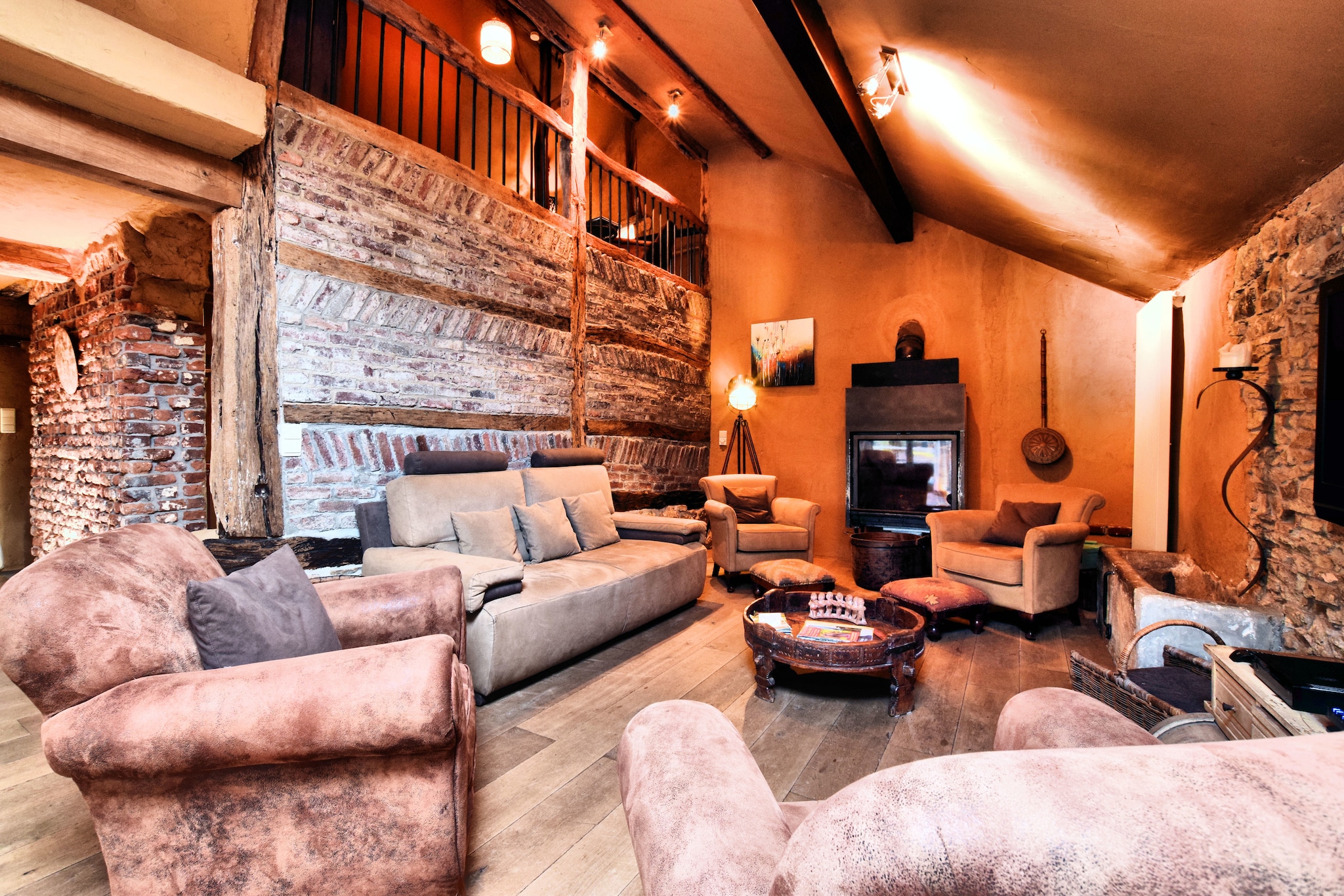 This charming holiday home in Oppagne offers a cozy and well-equipped stay for families or small groups. Located just 2 km from WÃ©ris and 8 km from Durbuy, itâ€™s an ideal base for exploring the Ardennes. Guests can enjoy outdoor adventures at Durbuy Adventure, discover the fairy-tale charm of Durbuy, or visit the spiritual Radhadesh Castle in Septon. Nature lovers will appreciate the scenic trails around the Ourthe River and the treetop fun at Parc Chlorophylle.

The property features two bedrooms, a spacious living/dining room with a fireplace and flatscreen TV, and a fully equipped kitchen with modern appliances. A recreation room with table football and darts adds entertainment, while the infrared sauna offers relaxation. The bathroom includes a bathtub and shower, and amenities like a washing machine, tumble dryer, and central heating ensure comfort. Outdoors, guests can enjoy a shared garden with a pond, terrace, barbecue, hammock, and play equipment.

Nearby dining options include Le Cor de Chasse in WÃ©ris for refined Belgian cuisine, La Bruâ€™sserie in Durbuy for seasonal dishes, and La Table de Manon in Grandhan for gourmet experiences.