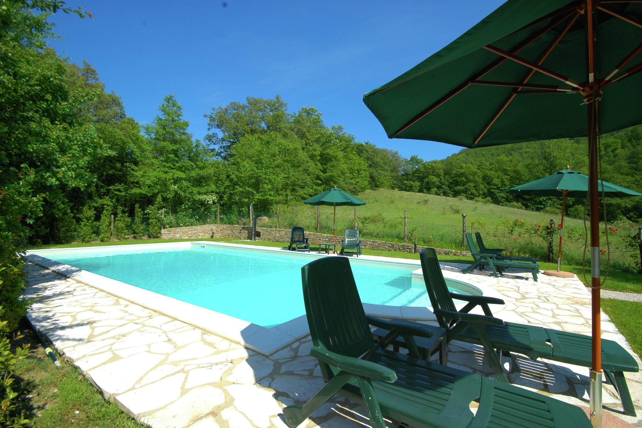 This 1-bedroom mansion in Lisciano Niccone is perfect for a small family or 3 persons. It has a private furnished terrace to enjoy the Italian sun with a cool drink and wait for the evenings to light up the barbecue. 
The mansion is located in the Niccone valley on the border with Tuscany and Umbria. In the surroundings, a combination of beautiful landscapes, castle ruins, vineyards, olive groves, hills, and forests is present. You will find the town center and several grocery stores at 1 km. Restaurants serving authentic Italian cuisine are at 2 km. Lake Trasimeno is 18 km away and great for a day out.
In the lovely furnished garden, you can enjoy healthy breakfasts before setting out on tours or activities. The shared swimming pool is great to take a refreshing dip on a hot day or after returning from tours or activities. Parking is available.
The airport is 38 km.
TIP: For your electric car: there are plenty of charging stations in the nearby village of Umbertide