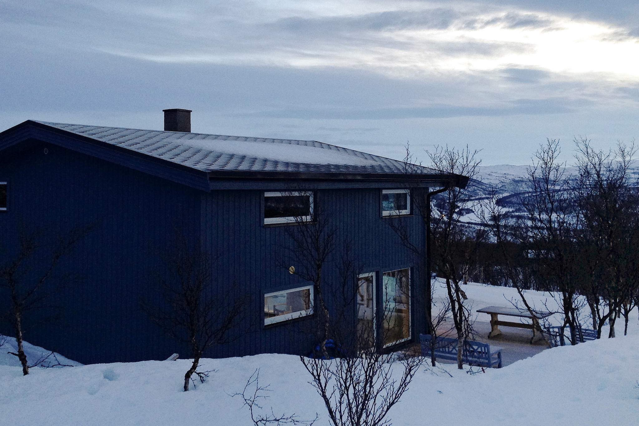 Comfortable cabin in wilderness surroundings at Skaidi. Nice view. Great starting point for day trips by car. Possibility of seeing Northern lights during winter. This cabin, completed in 2016, is located on the hillside up from Skaidi. The cabin is comfortable and has many modern solutions and underfloor heating in all living spaces on the ground floor. The cabin is on 2 levels with a kitchen, dining room and living room with fireplace, bathroom and 4 bedrooms on the ground floor, while the first floor consists of a large living room and one bedroom. Large windows in the living room provides a wonderful close contact with nature and a panoramic view towards Skaididalen and the river Skaidielva. From the living room on the ground floor, there is access to a large terrace. Living room with Satellite TV with many international channels, including German ones. Car parking directly by the cottage in summer, in winter there 50 m away. There are several other cabins in the area. This is a great place to experience Finnmark's beautiful nature both summer as winter. In spring and summer, the bright polar nets are a sight to behold, especially when the midnight sun shines. Winter is the time for darkness and the northern lights are definitely worth seeing. 4 km to alpine trail. Skaidi is a great and safe place for a winter holiday. 500 m to shop and eatery. Skaidi is also a great starting point for day trips by car around Finnmark, to Nordkapp and to the Russian border in the east. The Sami settlements of Karasjok and Kautokeino in the interior Finnmark is worth seeing. Skaidi is surrounded by wilderness that invites you to wonderful hikes, berry picking and fishing in the many fishing waters in the area. 300 m to Repparfjordelva, a great salmon river. To fish, you will need to purchase a fishing license. 5 km to the fjord Repparfjord, for fishing from shore. In autumn, the conditions here are good for hunting small game. Landlord offers snowmobile rental, price is given on request.