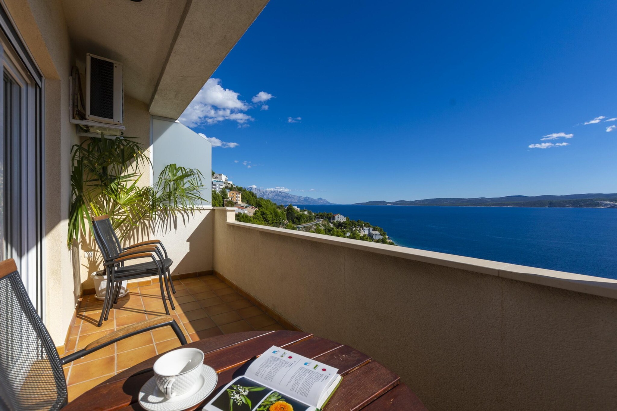 Shared pool apartment David- second floor - Terrasbalkon