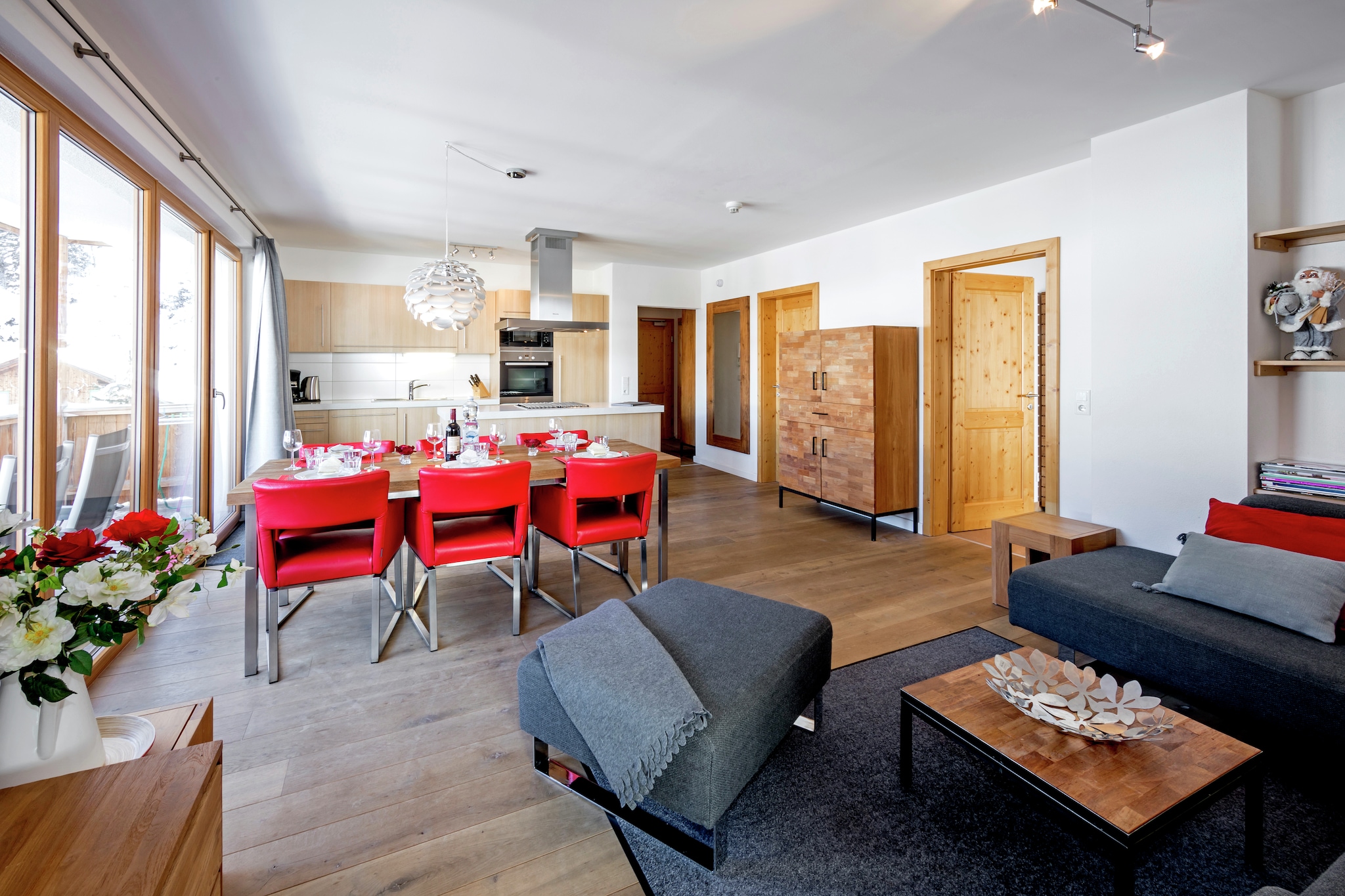 On the 2nd floor: (Living room(TV, dining table(6 persons), seating area, DVD player), open kitchen(cooker(induction), coffee machine, oven, microwave, dishwasher, fridge-freezer), bedroom(double bed, TV, balcony), bedroom(double bed, balcony), Bedroom with bathroom(double bed, TV, shower, washbasin), bathroom(bathtub with shower, shower, washbasin, toilet), toilet)\n\nChildren\'s bedroom, ski storage, garage, tumble dryer(shared with other guests, paid), washing machine(shared with other guests, paid), balcony, heating(floor heating), garden furniture, lift, children\'s bed, high chair