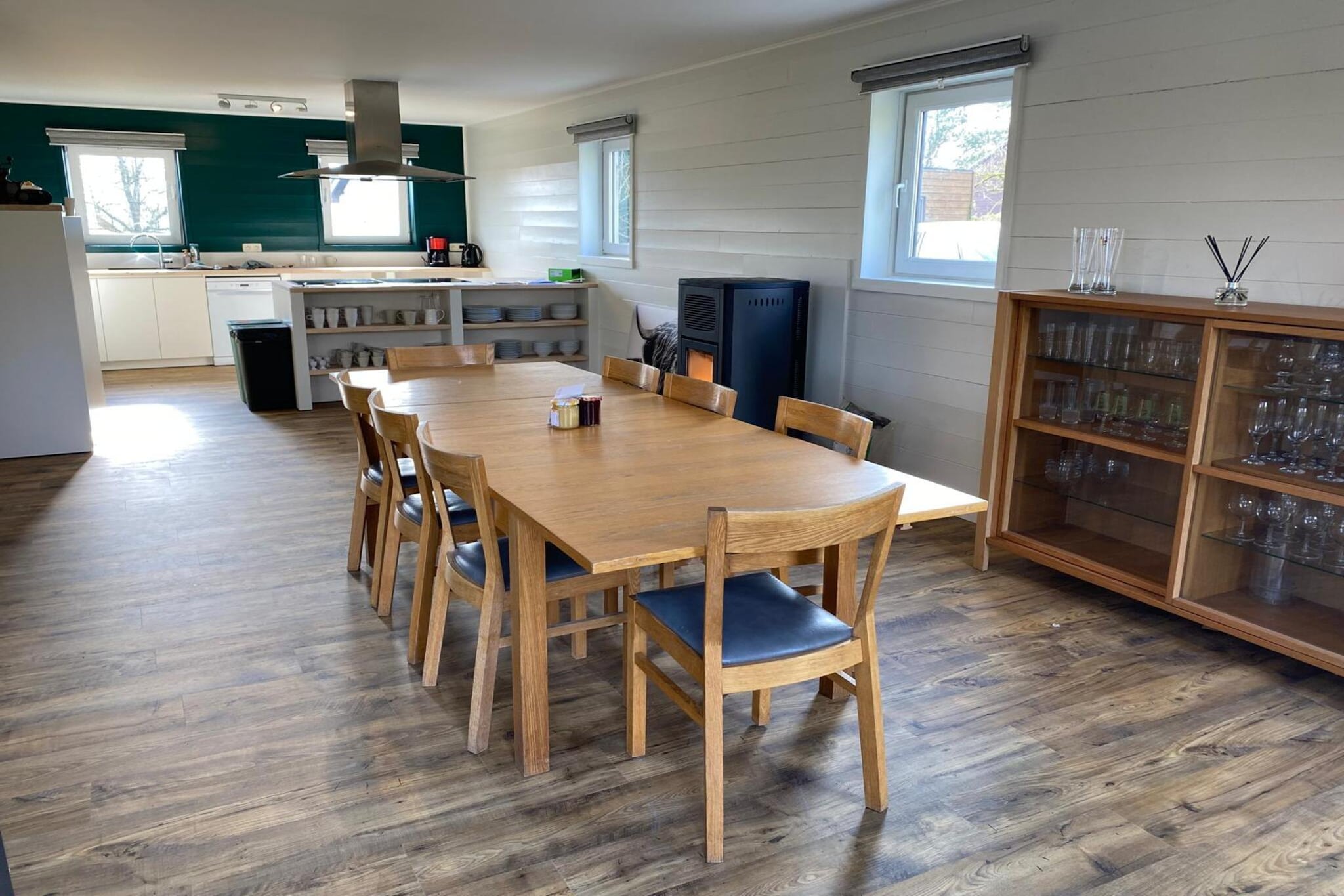 Ground floor: (Living room(TV, DVD player), open kitchen(bar, cooker(8 ring stoves), coffee machine, microwave, dishwasher, fridge(+ freezer)), bedroom(double bed), bathroom(shower), toilet, sauna)\n\nOn the 1st floor: (bedroom(double bed), bedroom(double bed), bedroom(double bed), bedroom(2x bunk bed), bathroom(shower), bathroom(bath tub), toilet)\n\nterrace, garden, garden furniture, BBQ, parking, play equipment