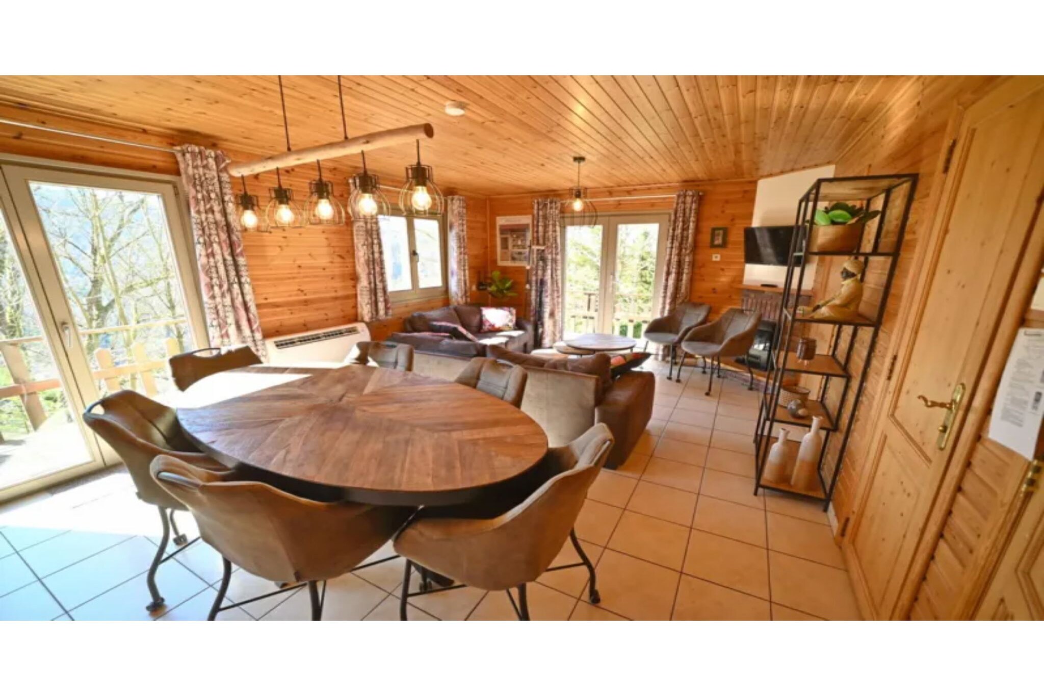 Ground floor: (bedroom(double bed), bedroom(2x single bed), bathroom(shower, washbasin), toilet, sauna)\n\nOn the 1st floor: (Living room(TV(flatscreen), dining table, seating area, DVD player), open kitchen(electric kettle, cooker(4 ring stoves, electric), coffee machine, microwave, dishwasher, fridge), bedroom(2x single bed), bedroom(bunk bed), bathroom(bath tub, washbasin), toilet)\n\ngarage, heating(electric), terrace, garden furniture, BBQ, table football, bicycles available, children\'s bed, high chair