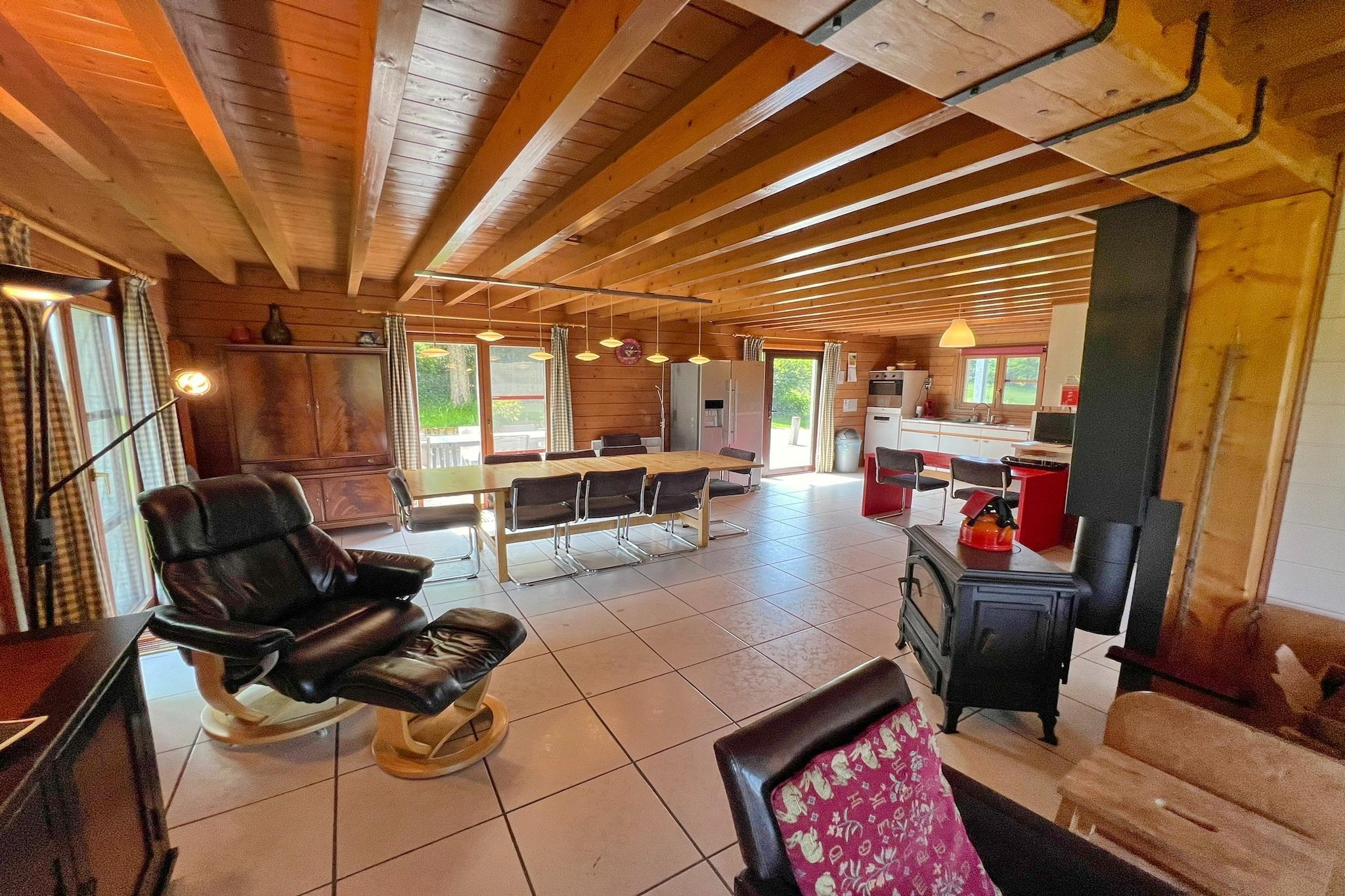 Ground floor: (open kitchen(electric kettle, cooker(4 ring stoves, electric), hood, coffee machine(filter, pads), oven, microwave, dishwasher, fridge-freezer), Living/diningroom(TV(cable, flatscreen, smart TV), dining table, stove(wood), seating area, DVD player), bedroom(single bed, single bed adapted for disabled), bathroom(shower, washbasin, washing machine), toilet)\n\nOn the 1st floor: (bedroom(4x single bed), bedroom(double bed), bedroom(double bed), bathroom(hip bath, shower), toilet)\n\ngarage, heating(electric), terrace, garden, garden furniture, BBQ, parking, table tennis table, high chair, Volleyball court