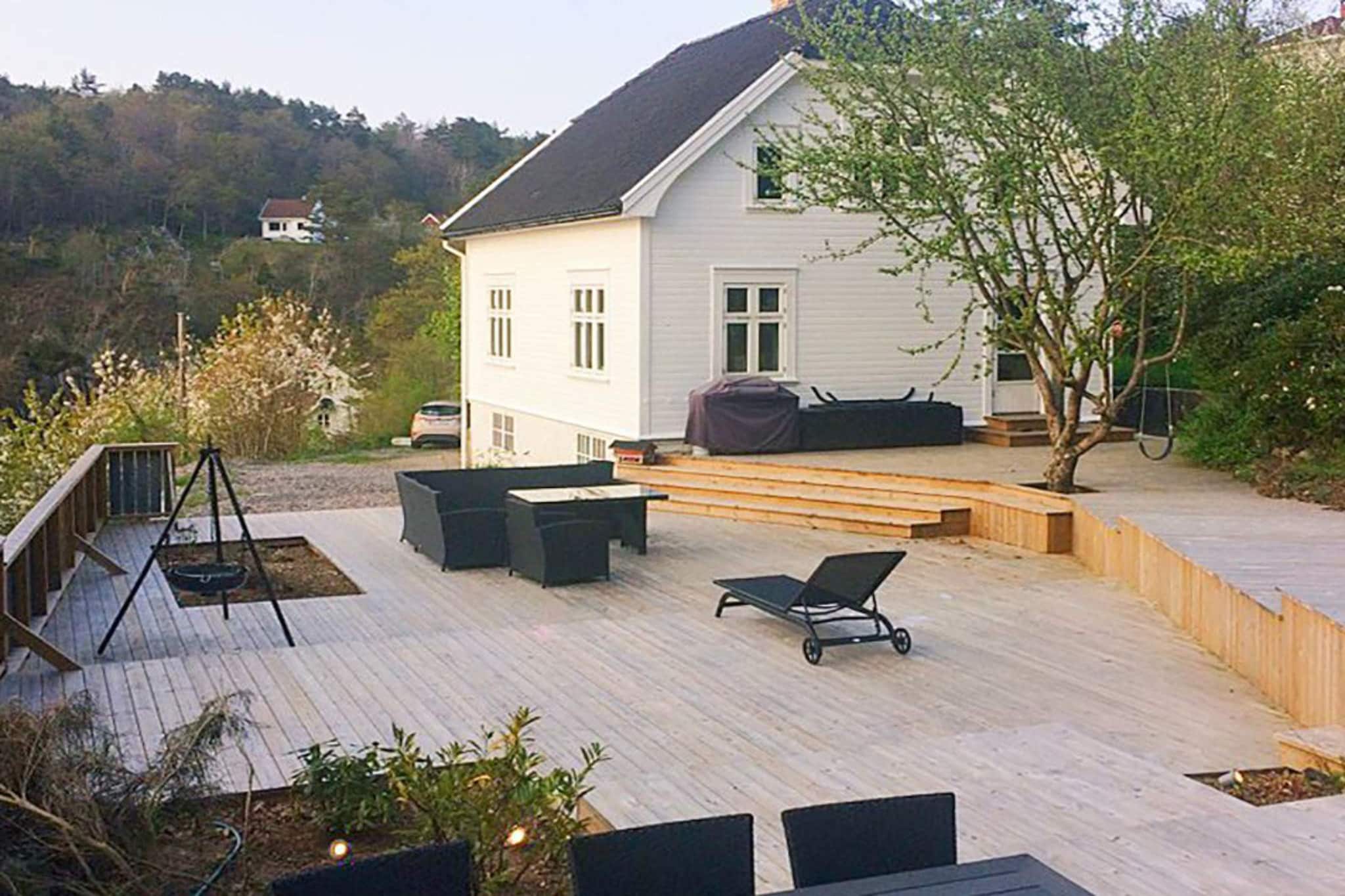 7 person holiday home in Høvåg