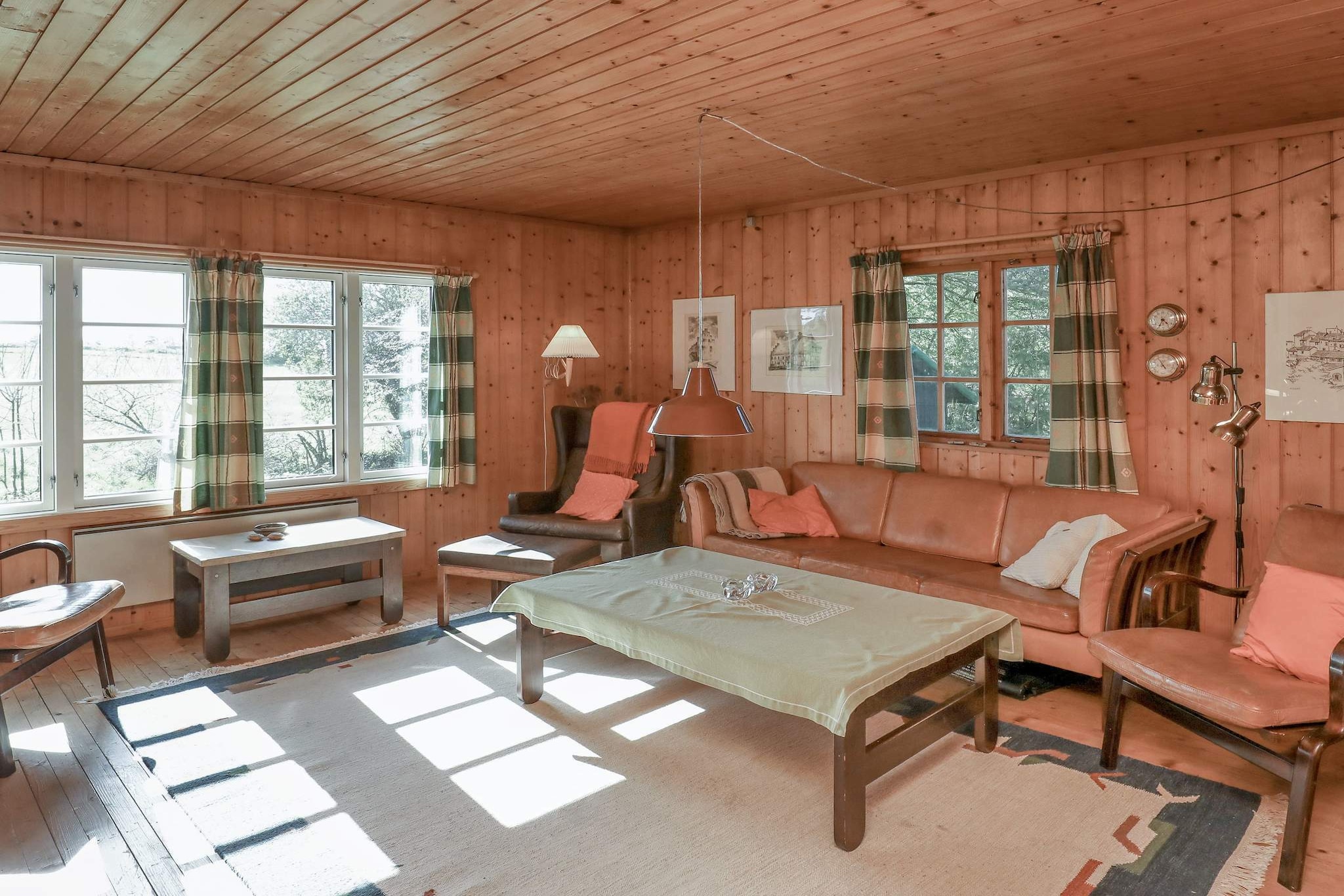 open kitchen(cooker(electric), hood, coffee machine, microwave, fridge(+ freezer)), Living/bed room(TV(cable, german television channels, danish TV channels (DR1 and TV2)), radio, CD player, stereo unit), bedroom(double bed), bedroom(single bed), bedroom(single bed), bathroom(bathtub or shower, washbasin, toilet, washing machine), washing machine, heating(electric), terrace(roofed)(garden furniture), air to air heatpump