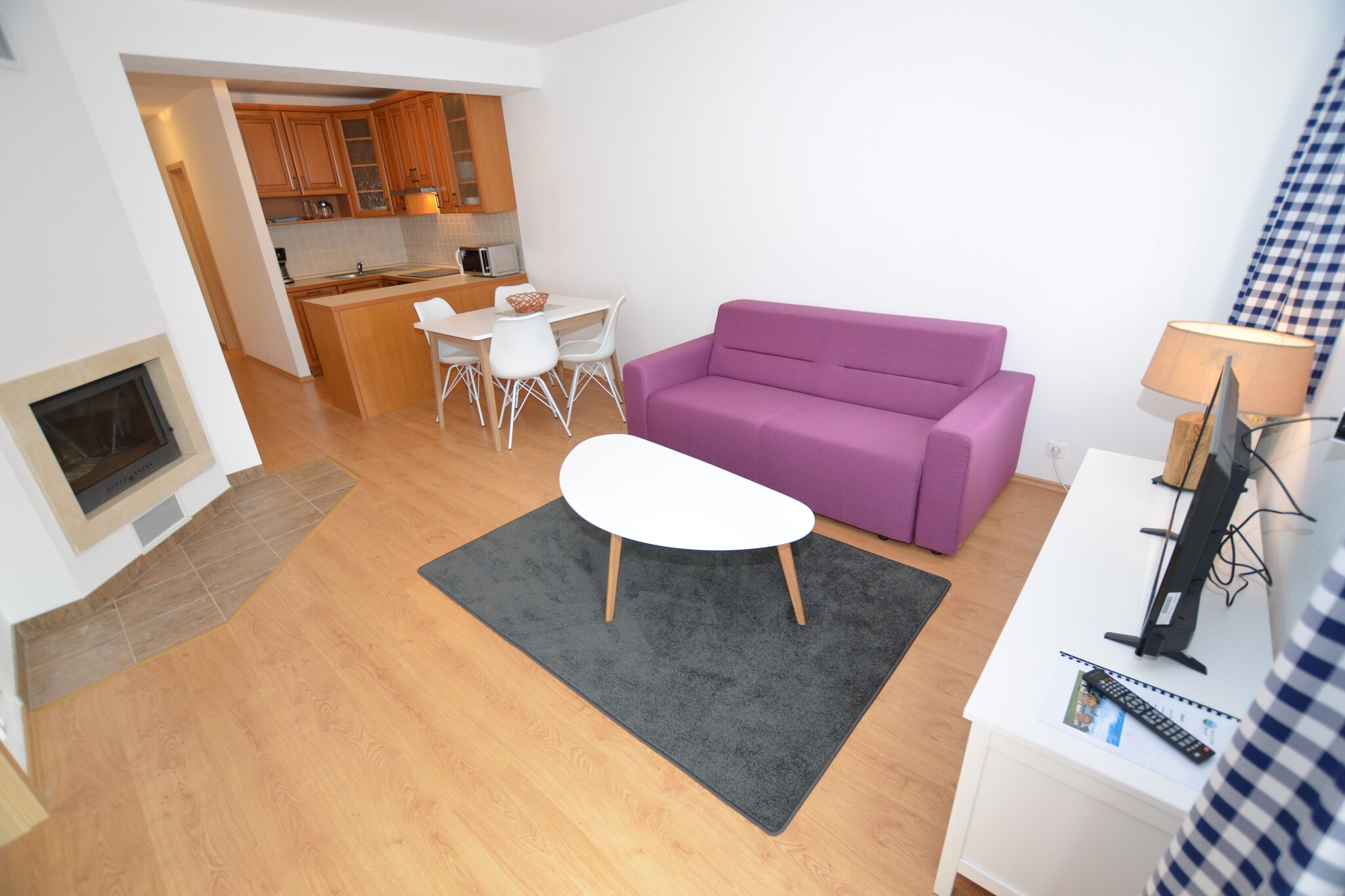 The luxurious apartment Nova Lake Resort is part of a new complex with 15 apartments in the village of Neuofen near the Lipno dam, the largest dam in the Czech Republic. The apartments are on the ground floor and are very tastefully furnished. They have WiFi, a dishwasher and a satellite TV. There is a central parking facility next to the house and there is also a storage room for bicycles and skis. The location of the house is ideal for your vacation, both in summer and in winter.

In the village of NovÃ¡ Pec, the Vltava flows into the Lipno Dam. This area is much quieter compared to the villages of Frymburk or Lipno and also offers more privacy. Water lovers on the Vltava can go canoeing between SoumarskÃ½ and NovÃ¡ Pec (canoes can be rented). The Lipno Dam is ideal for fishing and kite surfing. Excursions in the area: the town of ÄŒeskÃ½ Krumlov with a beautiful town reserve and a beautiful castle.

About Belvilla

When you stay in a Belvilla home, you can rest assured of a unique holiday home in ideal surroundings at an attractive price. The portfolio of accommodations consists of more than 40,000-holiday homes in 20 European countries. Interested in a weekend getaway, a summer or winter sports holiday or simply a short break? Do you prefer the coast, the countryside or the mountains? Whatever your preference, there is a Belvilla home to meet your needs, from a cosy gÃ®te for two to a castle big enough for the entire family, from an apartment in the heart of Rome to a cabin in the middle of nowhere, from a simple tree house to a luxury dream villa and from close to home to the other side of Europe.

A Belvilla home gives you the freedom to enjoy breakfast in your pyjamas or continue a good conversation into the morning hours without having to worry about the bar's closing time. Prepare gourmet meals with fresh local ingredients in your own kitchen and take advantage of having your own swimming pool to do as many cannonballs as you want! In other words, you can enjoy complete privacy in your home away from home.