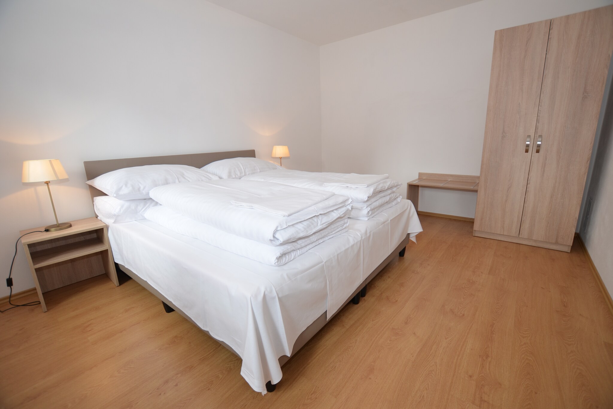 Ground floor: (open kitchen(stove, electric kettle, cooker(4 ring stoves, ceramic), coffee machine, microwave, dishwasher, fridge), Living/bed room(double sofa bed, TV(satellite, digital), seating area), bedroom(double bed), bathroom(shower, washbasin, toilet), Landing)\n\nheating(central), terrace, garden furniture, parking