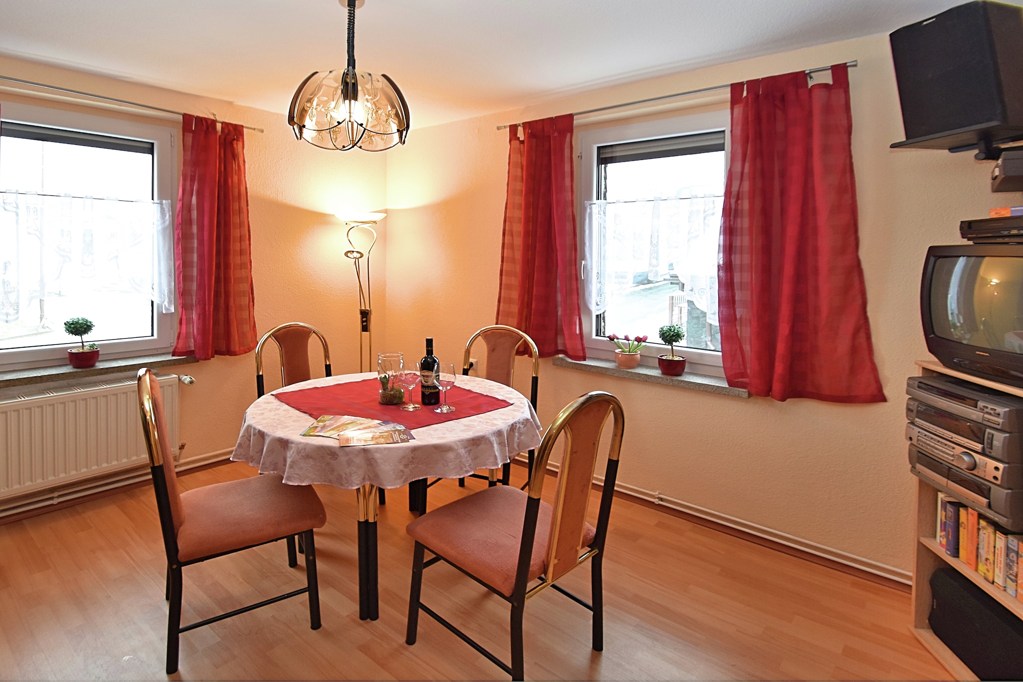 Set on the first floor in Tannenbergsthal, this practical and inviting apartment is tailored for small families or couples. The open-plan kitchen includes ceramic hob, oven, microwave, fridge-freezer, and coffee machine, while the dining roomâ€”with satellite TV, stereo unit, and DVD playerâ€”makes for cheerful meals and cozy movie nights. Sleeping arrangements are flexible with two bedrooms combining double beds and sofa beds. A bright bathroom with shower, washbasin, and toilet rounds out the essentials.

Family-friendly touches include a children's bed, playpen, play equipment, and charcoal BBQ outside in the shared, partially fenced garden. A washing machine, heating, and ironing board add comfort for longer stays. Parking is available on-site.

Ideally located just 200 m from forest trails and 500 m from restaurants, markets, and horse riding options. Whether exploring cross-country routes (300 m), hitting nearby ski slopes (6 km), or relaxing at the public pool (8 km), guests will find plenty of seasonal activities within reach.