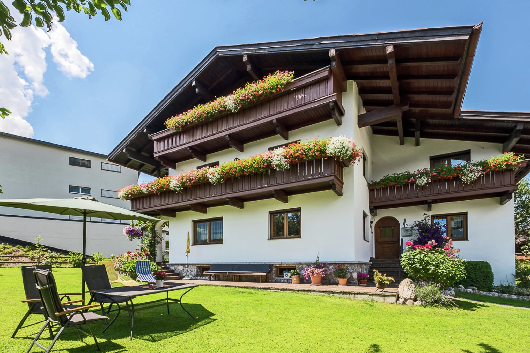 This holiday home is located near the beautiful Tyrolean village of FÃ¼gen. The house consists of 2 flats, the 1st one with a kitchen on the ground floor and 4 bedrooms with bathroom on the 1st floor. 

The owner of the accommodation lives on the ground floor and uses the shared staircase.

The house also has a heated ski cellar, a bicycle garage and a lawn with a swing. In the summer you can also use the BBQ, which is at your disposal. 

If you come in the winter for a wonderful winter sport, then you can leave your car at home. The ski bus stop is 200 m from the house. The bus takes you in a few minutes to the nearby Spieljochbahn lift and to the well-known Hochzillertal/HochfÃ¼gen ski area. FÃ¼gen - Spieljoch is generally very quiet and therefore an ideal ski area for beginners and families with children. There are hardly any waiting times at the ski lifts and even winter sports enthusiasts can have a great time here.

Summer in the Zillertal means hiking, culinary enjoyment and trips and activities. In summer, too, the cable cars take you to the most beautiful Alpine huts and mountain pastures.