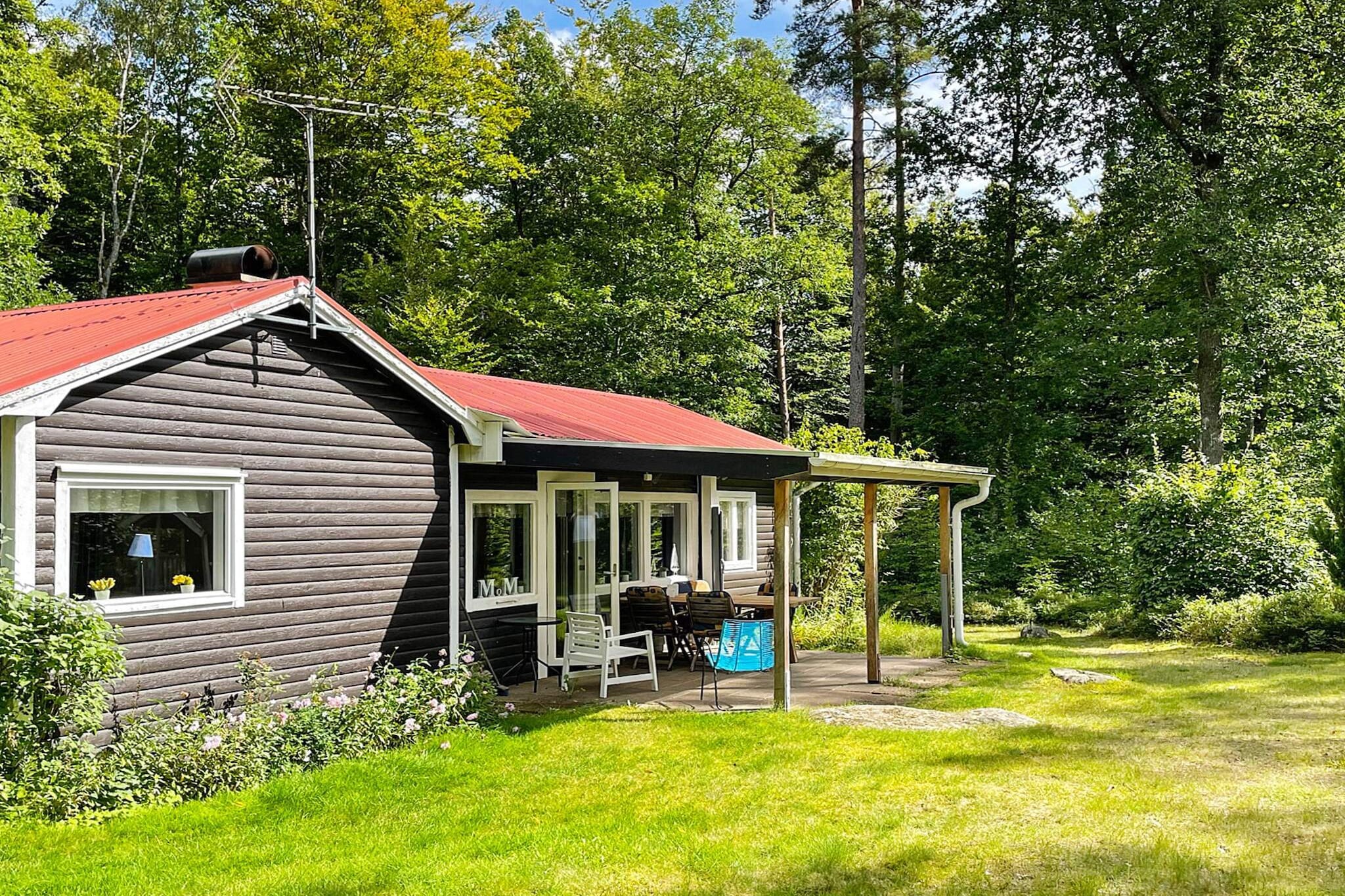 This delightful, cosy little cottage is set in the woods, only 15 metres from lake Lursjön. The lovely garden has plenty of space for the children to play and there's a comfortable, covered terrace where you can relax in the shade. A little path leads you through the pretty beech woods to the lake and your private dock. Here you will find the rowing boat that is included in the rent. If you enjoy fishing, you can get a fishing license for 100 SEK/week. The cottage features an open-plan kitchen and living room. The kitchen has a pellet stove and an electric cooker. In the living room you will find a comfortable sofa, and a wood burning stove. The spacious living room opens onto the comfortable roofed terrace with it's outdoor furniture. There are two bedrooms, one with two single beds, the other with a bunk bed. The bathroom features a WC, a washbasin, and a shower. Visit Hästveda which is nearby your holiday home. Why not go to the famous grocery store “Wahlqvist Specerier” and buy something new and unusual for dinner? They sell meat from wild boar, bear, crocodile, elk and deer. Please note: Household waste must be source separated for recycling. Welcome to a calm and peaceful environment, close to the lovely lake Lursjön!