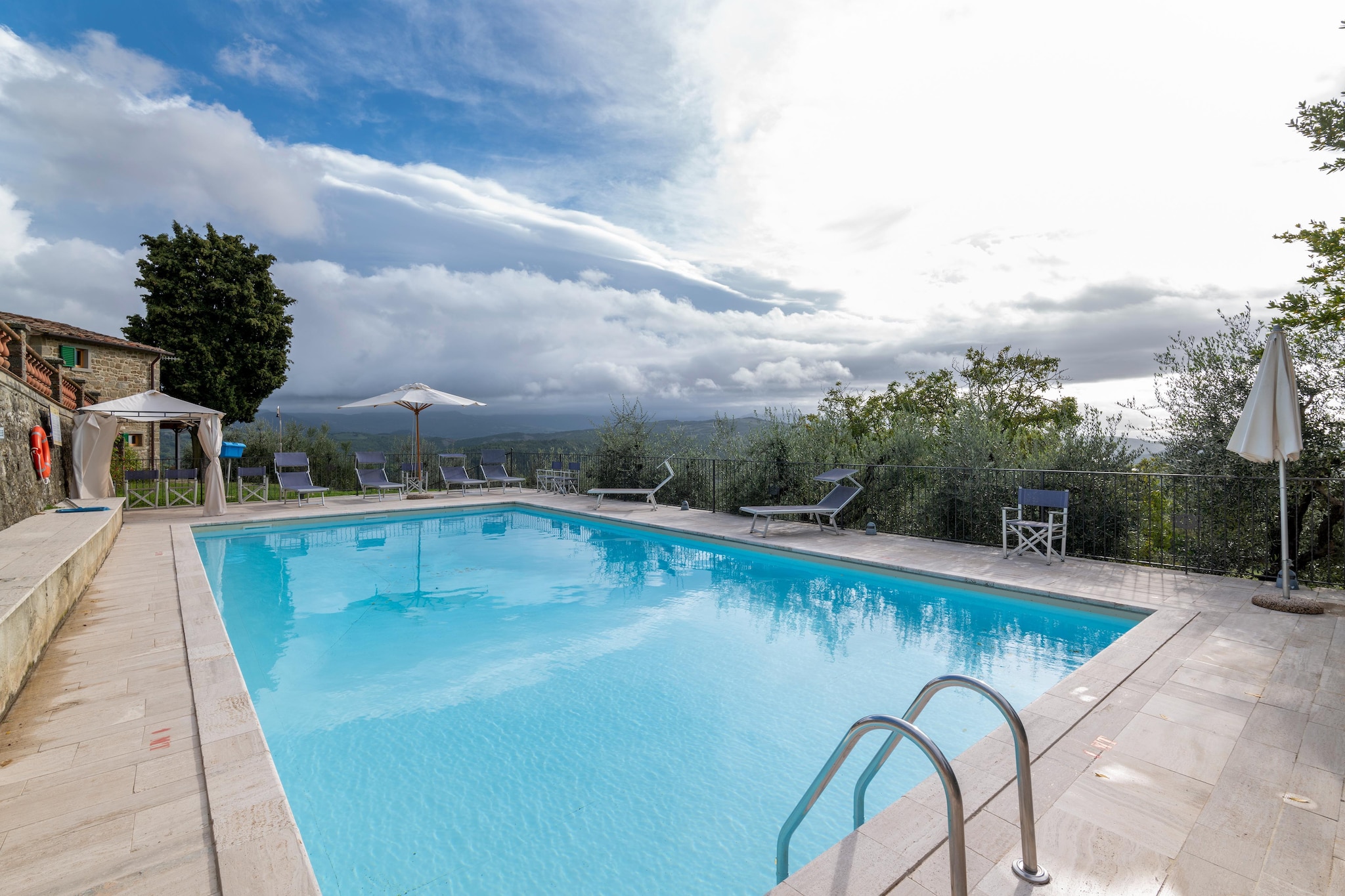 Enjoy a wonderful holiday in this unique holiday home in Tuscany’s Caprese Michelangelo with  a communal access to a garden and a swimming pool to unwind and enjoy a refreshing dive.. The property is ideal for couples with or without kids.

Great Tuscan art cities such as Florence, Arezzo and Siena and Umbrian cities such as Gubbio, Perugia and Assis are easily accessible by car. Picturesque hilly villages in the region are also worth a visit. Every village has its own charm and history. The city centre is only 3 km away, should you like to explore the area for restaurants, supermarkets and for shopping souvenirs.

You will be residing here at a beautiful estate. In an old farmhouse, on the ground floor is this beautiful apartment. From the terrace of the house, you enter the kitchen where you can prepare the tastiest meals. The wooden dining table is located with an easy seating area by the fireplace. For the house you can sit outside and enjoy the view over the Tuscan country.


About Belvilla

When you stay in a Belvilla home, you can rest assured of a unique holiday home in ideal surroundings at an attractive price. The portfolio of accommodations consists of more than 40,000-holiday homes in 20 European countries. Interested in a weekend getaway, a summer or winter sports holiday or simply a short break? Do you prefer the coast, the countryside or the mountains? Whatever your preference, there is a Belvilla home to meet your needs, from a cosy gîte for two to a castle big enough for the entire family, from an apartment in the heart of Rome to a cabin in the middle of nowhere, from a simple tree house to a luxury dream villa and from close to home to the other side of Europe.

A Belvilla home gives you the freedom to enjoy breakfast in your pyjamas or continue a good conversation into the morning hours without having to worry about the bar's closing time. Prepare gourmet meals with fresh local ingredients in your own kitchen and take advantage of having your own swimming pool to do as many cannonballs as you want! In other words, you can enjoy complete privacy in your home away from home.