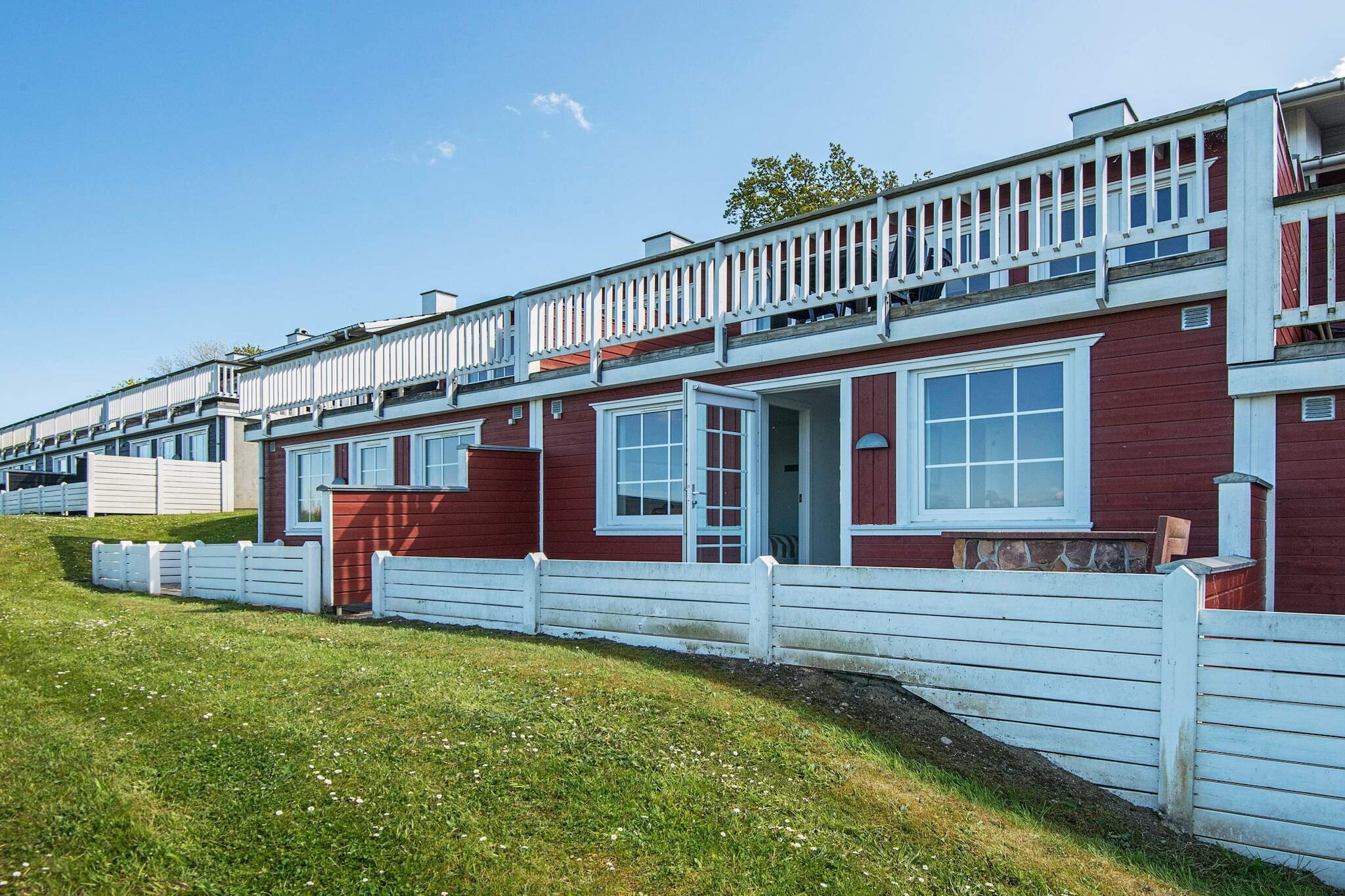 Modern, bright and well-furnished holiday cottage with whirlpool. There is every modern amenity needed. Panoramic view from bedrooms, living room and terraces. 2 large terraces in front of the house from which you have panoramic views. The house is part of Feriecenter Løjt which stretches all the way to the ocean at Genner Bugt (bay). On site there is a common, outdoor pool with a childrens' section  (15.05-15.09) and an activity room with table tennis and airhockey.A refundable deposit might be charged closer to your check-in date. The security deposit ensures a smooth stay and covers any additional services or consumption charges.This deposit covers utilities consumed during your stay and any additional services that may be taken.The final amount will be adjusted based on actual meter readings, actual usage of extra services, and any remaining balance will be refunded within 21 days after checkout.This deposit simply acts as a prepayment for charges that  you would anyways pay for, ensuring a seamless stay and check-out experience.