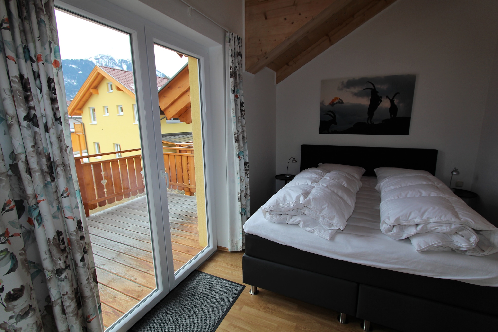Ground floor: (hallway, Living room(TV(flatscreen, satellite), stove(wood), seating area, DVD player, stereo unit), open kitchen(cooker(4 ring stoves, ceramic), coffee machine, oven, microwave, dishwasher, fridge), sanitary facility(washbasin, toilet))\n\nOn the 1st floor: (bedroom(double bed), bedroom(2x single bed), bathroom(shower, washbasin, toilet), bathroom(shower, washbasin, toilet))\n\nOn the 2nd floor: (mezzanine(2x single bed))\n\nstorage, ski storage, carport, fireplace, ski boot heaters, garden doors, terrace, garden, garden furniture, BBQ(electric), parking, children\'s bed, high chair, insect screens