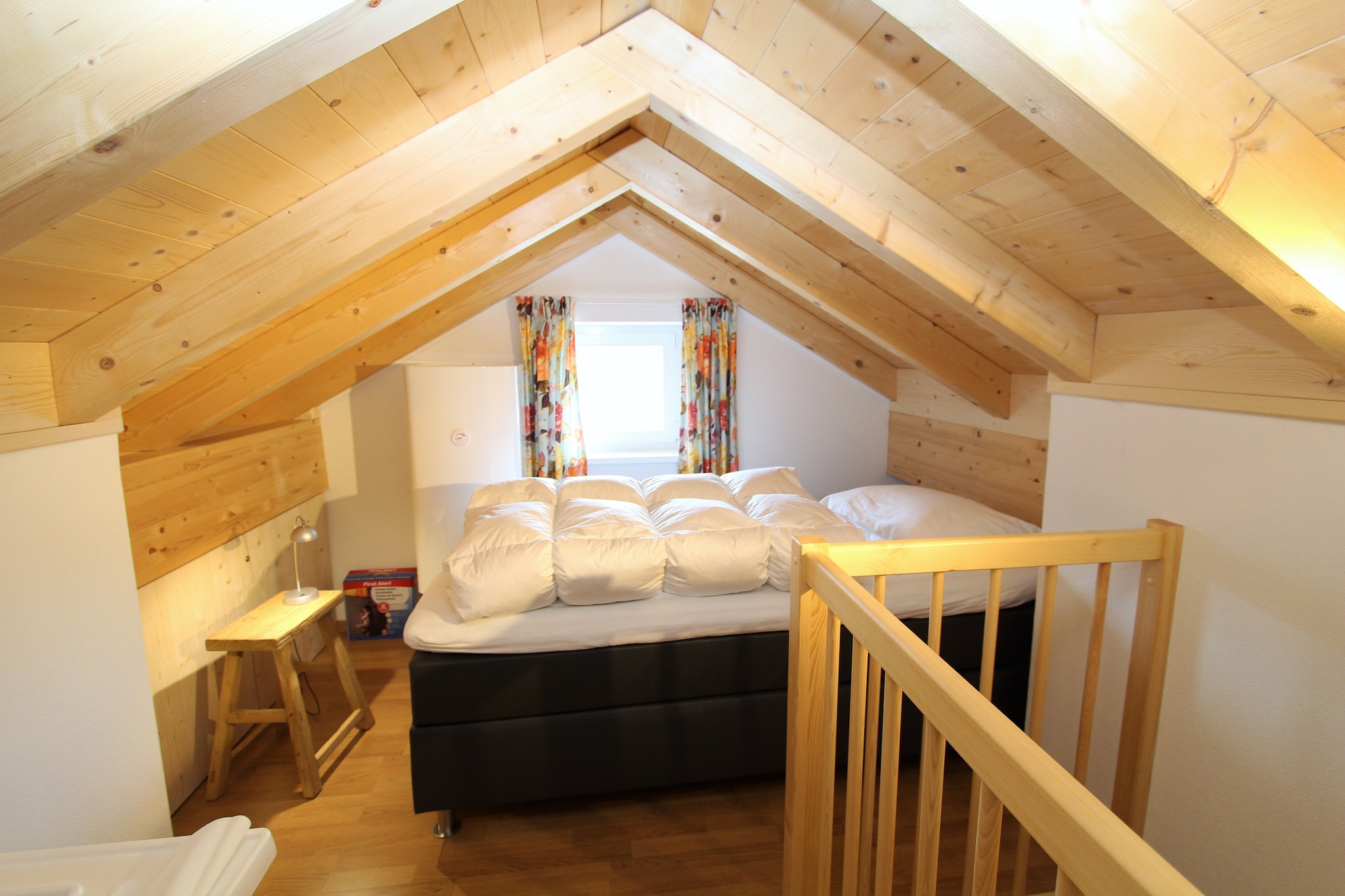 Ground floor: (hallway, Living room(TV(flatscreen, satellite), stove(wood), seating area, DVD player, stereo unit), open kitchen(cooker(4 ring stoves, ceramic), coffee machine, oven, microwave, dishwasher, fridge), sanitary facility(washbasin, toilet))\n\nOn the 1st floor: (bedroom(double bed), bedroom(2x single bed), bathroom(shower, washbasin, toilet), bathroom(shower, washbasin, toilet))\n\nOn the 2nd floor: (mezzanine(2x single bed))\n\nstorage, ski storage, carport, fireplace, ski boot heaters, garden doors, terrace, garden, garden furniture, BBQ(electric), parking, children\'s bed, high chair, insect screens