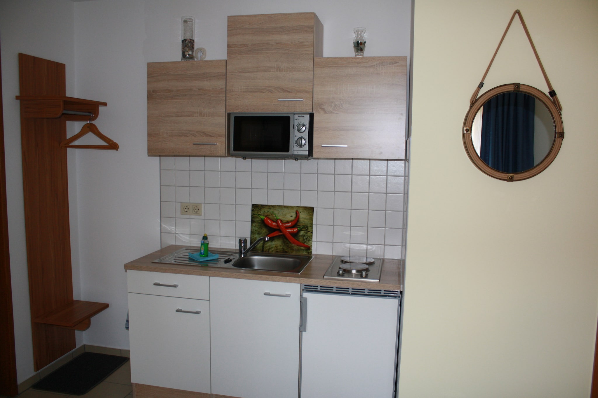 Ground floor: (Kitchenette(electric kettle, toaster, cooker(2 ring stoves), coffee machine, microwave, fridge-freezer), Living/bed room(single bed(95 x 200 cm), TV(satellite), radio, CD player), bathroom(shower, washbasin, toilet, hairdryer), heating)\n\nbicycle storage, parking