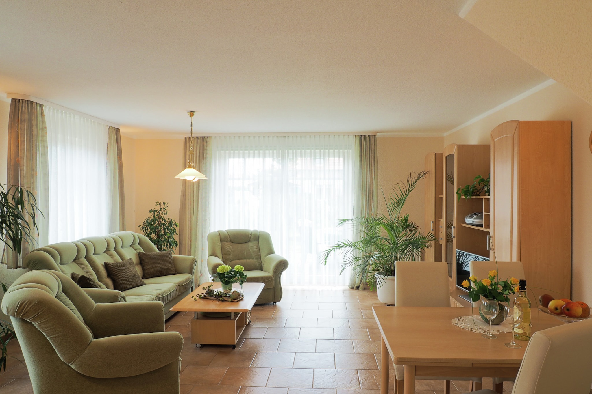 Located in the beautiful seaside resort of Kühlungsborn, this modern 2-bedroom apartment is ideal for a couple, small family, or close friends. It offers a relaxing setting with a private terrace, a shared garden, and barbecue facilities, perfect for enjoying sunny afternoons outdoors.
Just 1.2 km from the sandy Baltic Sea beach and town center, and only 300 m from the nearest supermarket, the location ensures convenience without compromising on peace. The nearest airport is 43 km away.
The apartment features a cozy living and dining area with a flat-screen TV, DVD player, and a well-equipped open kitchen with an oven, microwave, and dishwasher. Upstairs, you'll find two inviting bedrooms, one with a double bed (with separate duvets) and one with a single bed, along with an additional toilet.
Child-friendly amenities include a high chair, children’s bed, sleeping niche, and hairdryer. Heating is available for cooler days. Bicycles are also available for a small fee, and on-site parking is provided. WiFi is included for your convenience.