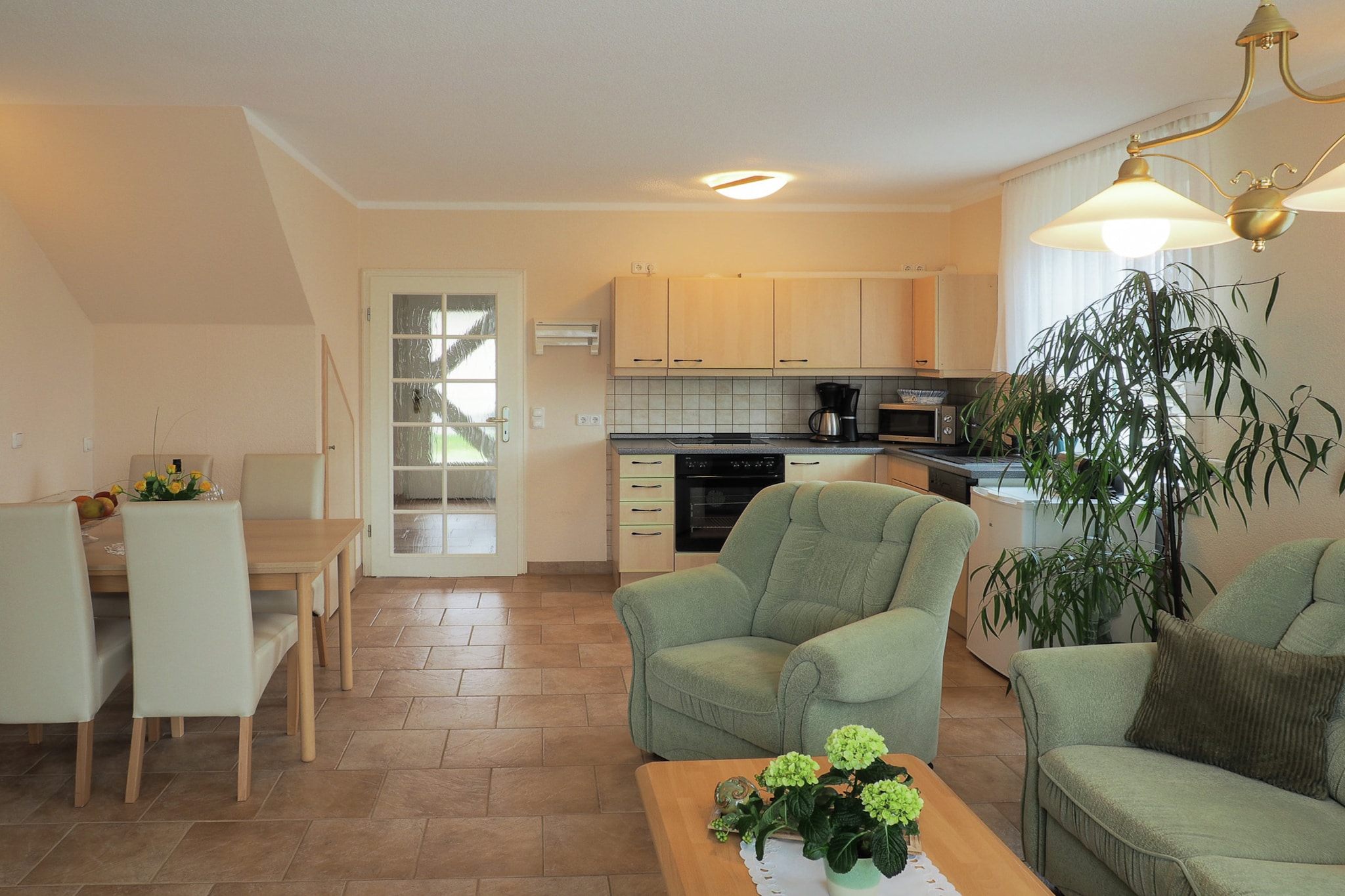 Ground floor: (Entrance(reachable from the outside), open kitchen(cooker(4 ring stoves), oven, microwave, dishwasher, fridge(+ freezer)), Living/diningroom(TV(flatscreen), dining table, seating area, DVD player), bathroom(shower, washbasin, toilet), radio, CD player)\n\nOn the 1st floor: (hallway, bedroom(double bed(two single duvets, two single fitted sheets)), bedroom(single bed), toilet)\n\nheating, terrace, garden(shared with the owner ), garden furniture, BBQ, parking, children\'s bed, high chair, hairdryer
