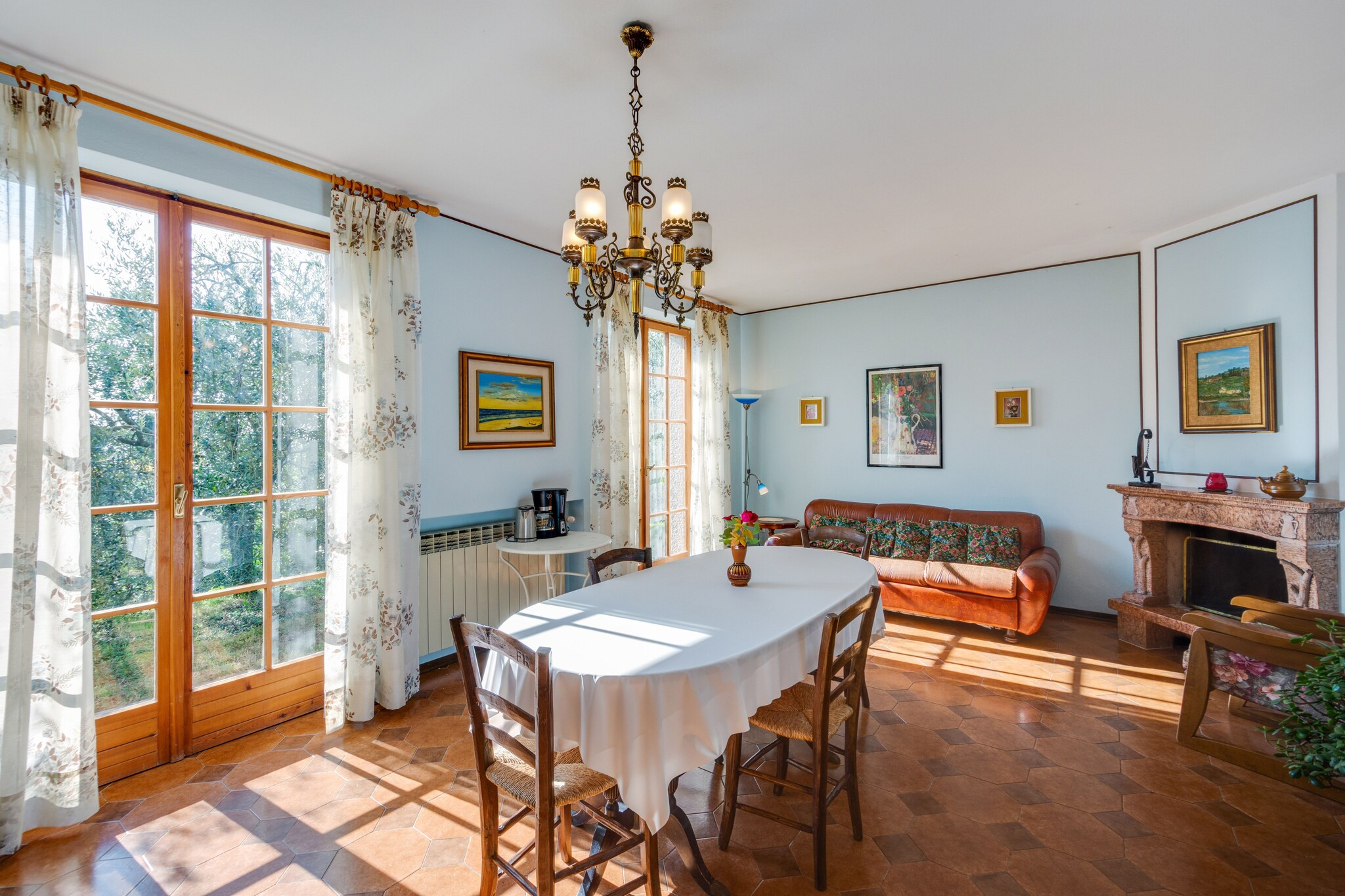 Situated in a quiet hilly area, this 2-bedroom holiday home in Marciaga accommodates 4 guests and is ideal for a family with children to stay. There is a fenced garden and barbecue to enjoy.



Enjoy the the beautiful olive groves in the area on foot, bicycle, or by hiking. The town center of Garda is only 1.9 km away to experience the pizzerias, restaurants and the many shops. 



The kitchen is spacious and has all modern amenities like oven, dish washer, and fridge freezer. It also has a dining table and a fireplace to enjoy the meals. Kids have a cot and high chair for a small fee. You can enjoy the beauty of the surrounding olive groves and the wonderful views of the Gulf of Garda  from the garden and finish the day with a delicious barbecue. Parking is also provided.



Check-in timings are 5 Â– 7 PM and  check-out timings are 9 Â– 10 AM.