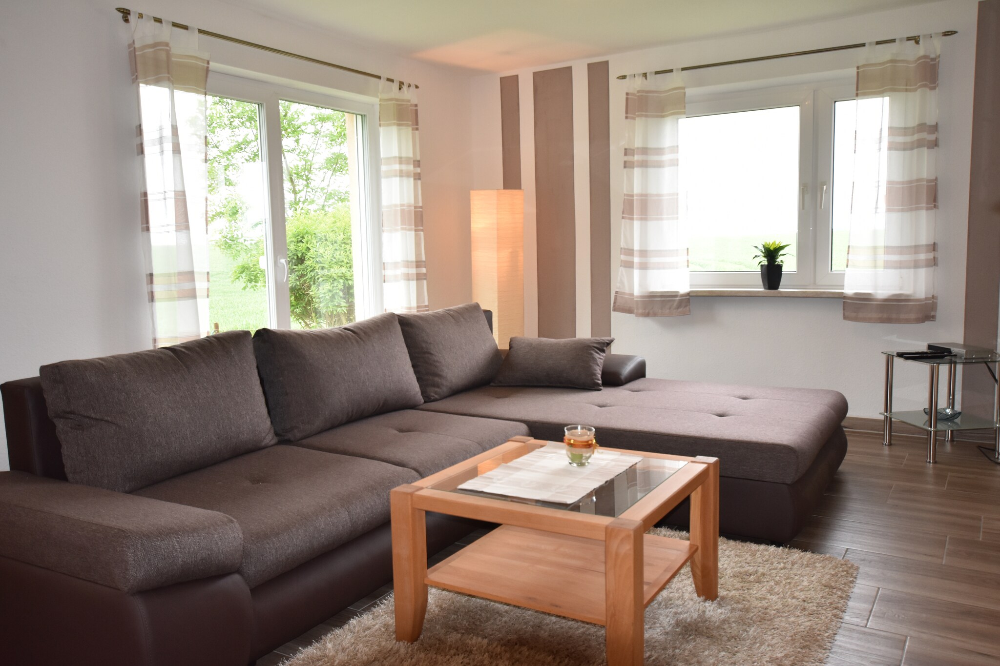 This peaceful 1-bedroom apartment is located on the ground floor in Robertsdorf, Baltic Sea. It has a sunny terrace with garden furniture and a living-bed room with a wood burner, making it perfect for couples.

You can head to Wismar, 15 km away for a day trip to its churches, old town, and market. Salzhaff is another great spot for various activities including surfing, cycling, diving, and horse riding. Just 0.5 km away from the sea, you cannot miss being at the seaside. To fetch groceries and bread, you’ll have to go 6 km.

The apartment is in a quiet location on a large plot in front of an island, offering privacy and tranquility at the same time. There is a nice kitchen for preparing delicious meals. In the near future, a freezer will also be offered in addition to a refrigerator. The wood burner in the living-dining area provides a lot of comfort on colder days. You can enjoy the sunny days at the terrace, by having meals and drinks. At night, you can sit by the fire bowl in the garden area, conversating and making memories.

About Belvilla

When you stay in a Belvilla home, you can rest assured of a unique holiday home in ideal surroundings at an attractive price. The portfolio of accommodations consists of more than 40,000 holiday homes in 20 European countries. Interested in a weekend getaway, a summer or winter sports holiday or simply a short break? Do you prefer the coast, countryside or mountains? Whatever your preference, there is a Belvilla home to meet your needs, from a cosy gîte for two to a castle big enough for the entire family, from an apartment in the heart of Rome to a cabin in the middle of nowhere, from a simple tree house to a luxury dream villa and from close to home to the other side of Europe.

A Belvilla home gives you the freedom to enjoy breakfast in your pyjamas or continue a good conversation into the morning hours without having to worry about the bar's closing time. In other words, you can enjoy complete privacy in your home away from home.