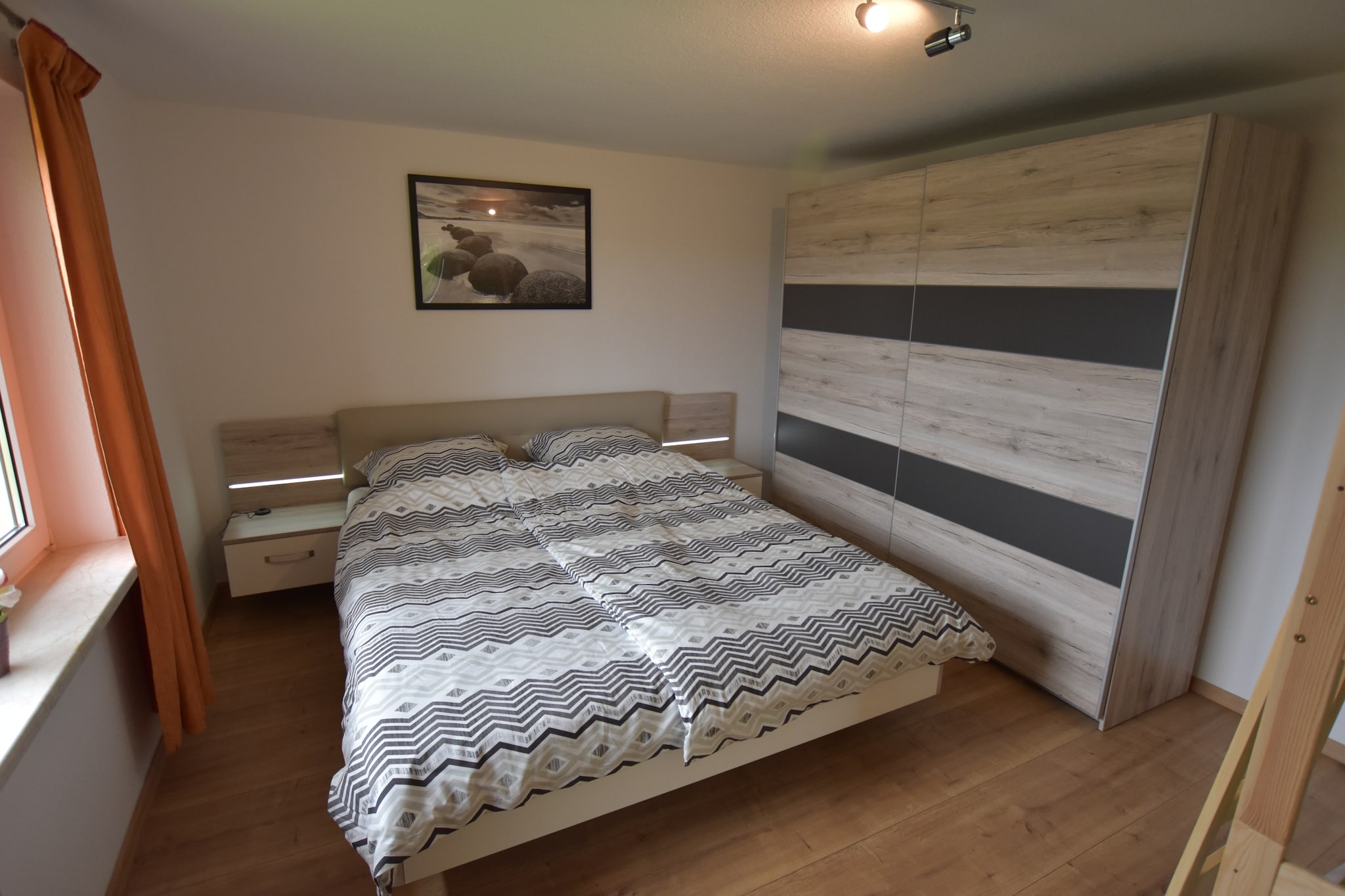 Ground floor: (Kitchen(dining table, cooker, hood, coffee machine, oven, microwave, fridge), Living/bed room(single folding bed, single sofa bed, TV, dining table, fireplace, stove, seating area), bedroom(double bed, bunk bed), bathroom(bath tub, shower, washbasin, toilet, washing machine), children\'s bed, high chair)\n\nbathtub or shower, heating, terrace, garden(fenced), bicycle storage, garden furniture, sun loungers, BBQ, parking, trampoline, deckchairs, parasol, ironing board, party games