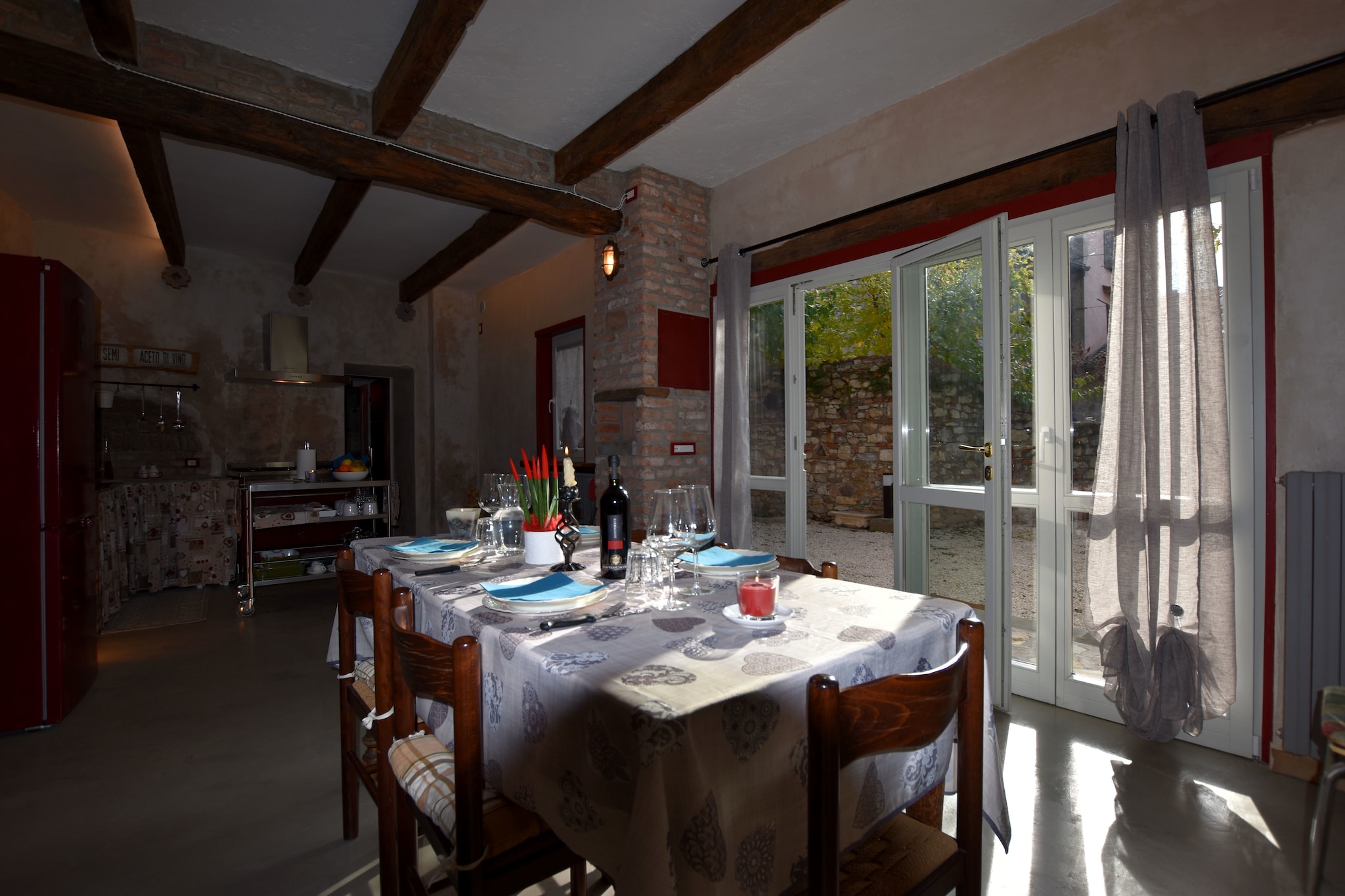 An optional utilities and service fee of EUR 80,00 will be charged before your arrival. Details are given below.<br> Mansion with Historic Character
Step into this enchanting mansion in Provaglio d'Iseo, nestled within an ancient farmstead dating back to the 13th century. The interiors blend authentic antique elements like wooden beams with modern comforts, creating a warm and inviting atmosphere. The spacious living room with TV, dining area, and open kitchen are perfect for relaxed family gatherings. Outside, a furnished courtyard with garden furniture and a barbecue invites you to enjoy meals or drinks in peaceful surroundings. Practical amenities like a washing machine, heating, and a cot ensure a comfortable stay. Explore the Natural and Cultural Surroundings
Located just steps from the town center, this mansion offers easy access to local shops and restaurants only 500 meters away. The stunning Lake Iseo lies just 3 km from the property, ideal for lakeside walks, boat trips, or relaxing by the water. Nearby hiking trails start right from the doorstep, winding through lush landscapes and offering a perfect escape into nature. History lovers will appreciate the setting in a former monastic settlement, providing a unique cultural backdrop to your stay. <br><b> Optional Utilities & Service Package </b><br><b> An optional utilities and service package of EUR 80,00 </b> can be selected prior to your arrival. You will receive a separate communication with the payment link should you wish to include it.<br>This package ensures a seamless stay and conveniently covers services such as final cleaning, utility consumption, service support, and protection against minor damages or incidental costs during your stay.<br>Guests who prefer may manage these services independently, provided the property is returned in good order at check-out.