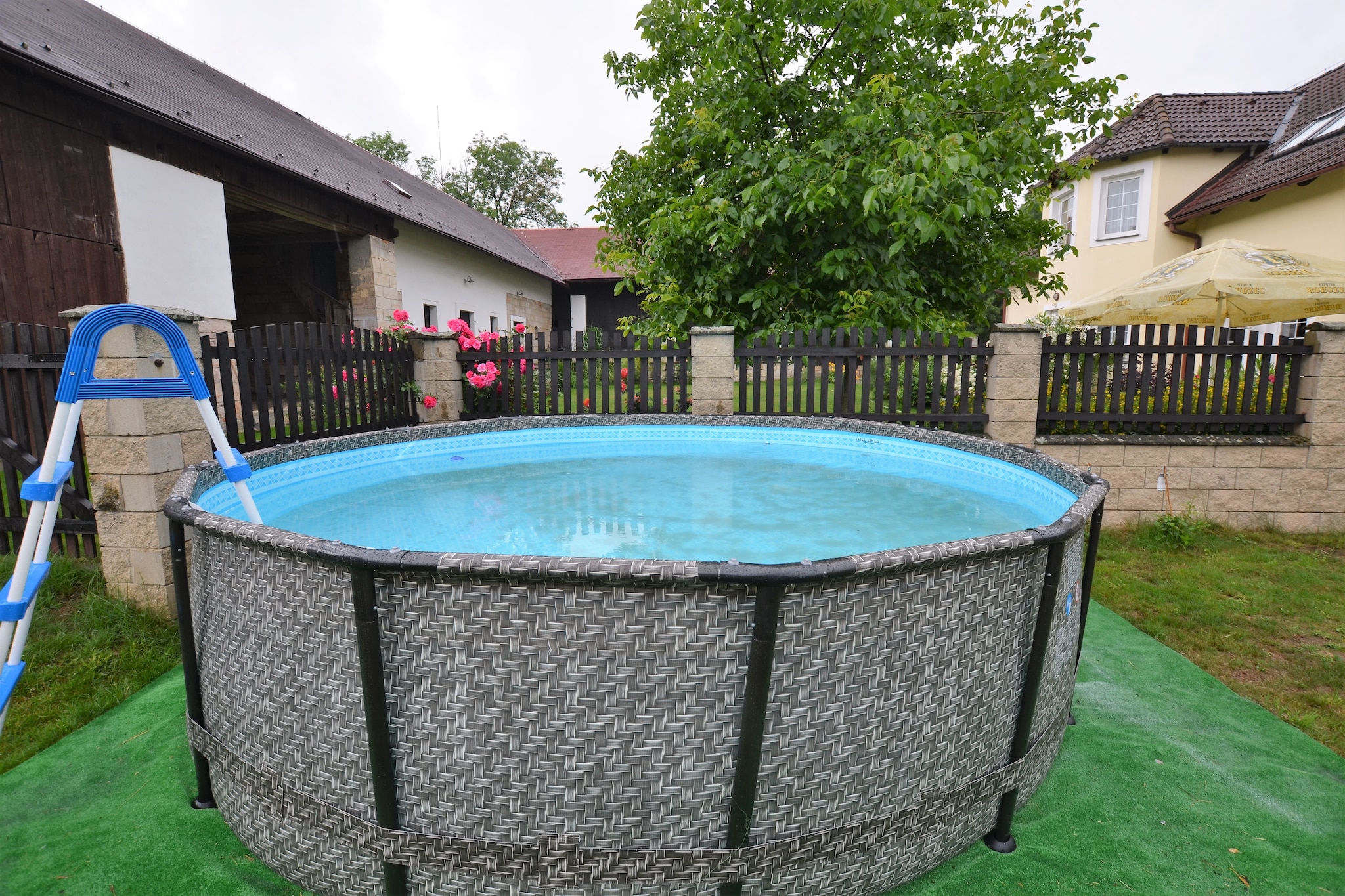 An optional utilities and service fee of EUR 80,00 will be charged before your arrival. Details are given below.<br> This detached, spacious villa has an enclosed garden with swimming pool. It is very suitable for friends and families with children. The residence is located in the village of SÃ½koÅ™ice, centrally located in the Bohemian Paradise and 11 km east of the town of Turnov, where you can visit a beautiful outdoor swimming pool. The location of the villa is ideal for walks and bike rides. Sights nearby: the ruins of Trosky, the castles of HrubÃ¡ SkÃ¡la, HrubÃ½ Rohozec and Sychrov, the castle ValdÅ¡tejn and the famous rock towns. A visit to the capital Prague is of course also worthwhile. The villa was carefully renovated in 1997. With a comfortable interior, attractive living rooms and a well-equipped kitchen, it has all the ingredients for a perfect holiday. Unwind in the sauna or enjoy a glass of wine on the beautiful terrace. Parking is available for 3 to 4 cars and possibly motorbikes or bicycles in the garage. About Belvilla When you stay in a Belvilla home, you can rest assured of a unique holiday home in ideal surroundings at an attractive price. The portfolio of accommodations consists of more than 40,000-holiday homes in 20 European countries. Interested in a weekend getaway, a summer or winter sports holiday or simply a short break? Do you prefer the coast, the countryside or the mountains? Whatever your preference, there is a Belvilla home to meet your needs, from a cosy gÃ®te for two to a castle big enough for the entire family, from an apartment in the heart of Rome to a cabin in the middle of nowhere, from a simple tree house to a luxury dream villa and from close to home to the other side of Europe. A Belvilla home gives you the freedom to enjoy breakfast in your pyjamas or continue a good conversation into the morning hours without having to worry about the bar's closing time. Prepare gourmet meals with fresh local ingredients in your own kitchen and take advantage of having your own swimming pool to do as many cannonballs as you want! In other words, you can enjoy complete privacy in your home away from home. <br><b> Optional Utilities & Service Package </b><br><b> An optional utilities and service package of EUR 80,00 </b> can be selected prior to your arrival. You will receive a separate communication with the payment link should you wish to include it.<br>This package ensures a seamless stay and conveniently covers services such as final cleaning, utility consumption, service support, and protection against minor damages or incidental costs during your stay.<br>Guests who prefer may manage these services independently, provided the property is returned in good order at check-out.