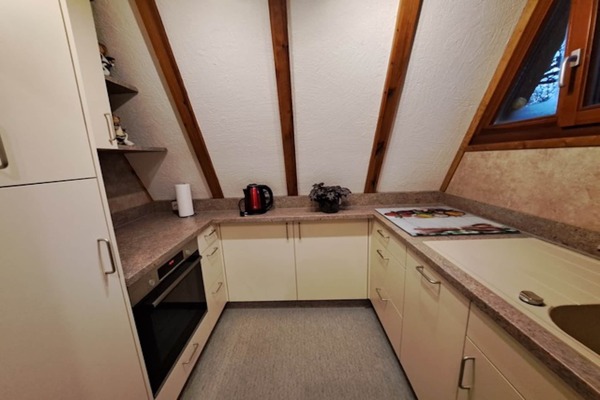 Ground floor: (Entrance, Kitchen(electric kettle, toaster, cooker(4 ring stoves, ceramic, induction), coffee machine(filter), oven, dishwasher, fridge(+ freezer)), Living/diningroom(TV(satellite), dining table, radio), bathroom(shower, washbasin, toilet))\n\nOn the 1st floor: (bedroom(2x single bed(90 x 200 cm)), walk-through bedroom(single bed(90 x 200 cm)))\n\ncarport, heating(central), terrace(private, roofed, 15 m2), garden(private, fenced, 250 m2), bicycle storage, garden furniture, BBQ, parking, deckchairs, parasol, stair gate